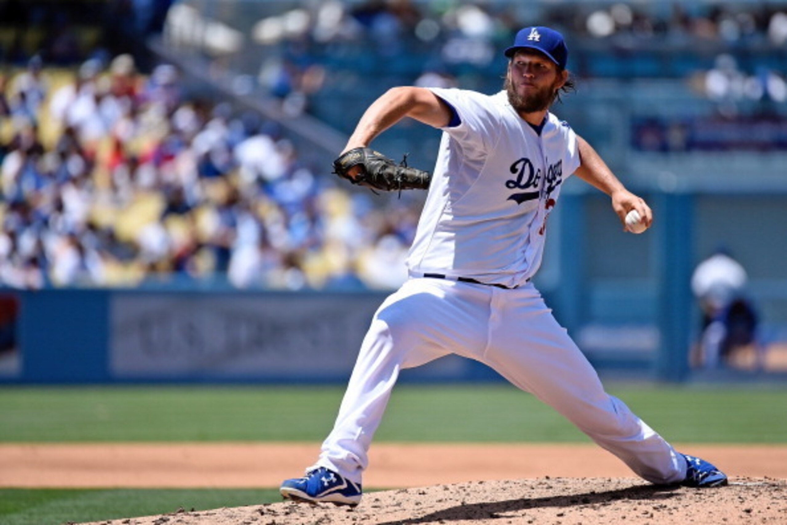 LOS ANGELES, CA - JUNE 29:  Clayton Kershaw #22 of the Los Angeles Dodgers pitches against the St Louis Cardinals at Dodger Stadium on June 29, 2014 in Los Angeles, California.  (Photo by Lisa Blumenfeld/Getty Images)