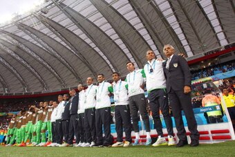 PORTO ALEGRE, BRAZIL - JUNE 30:  Head coach Vahid Halilhodzic of Algeria (R) looks on from the bench prior to the 2014 FIFA World Cup Brazil Round of 16 match between Germany and Algeria at Estadio Beira-Rio on June 30, 2014 in Porto Alegre, Brazil.  (Pho