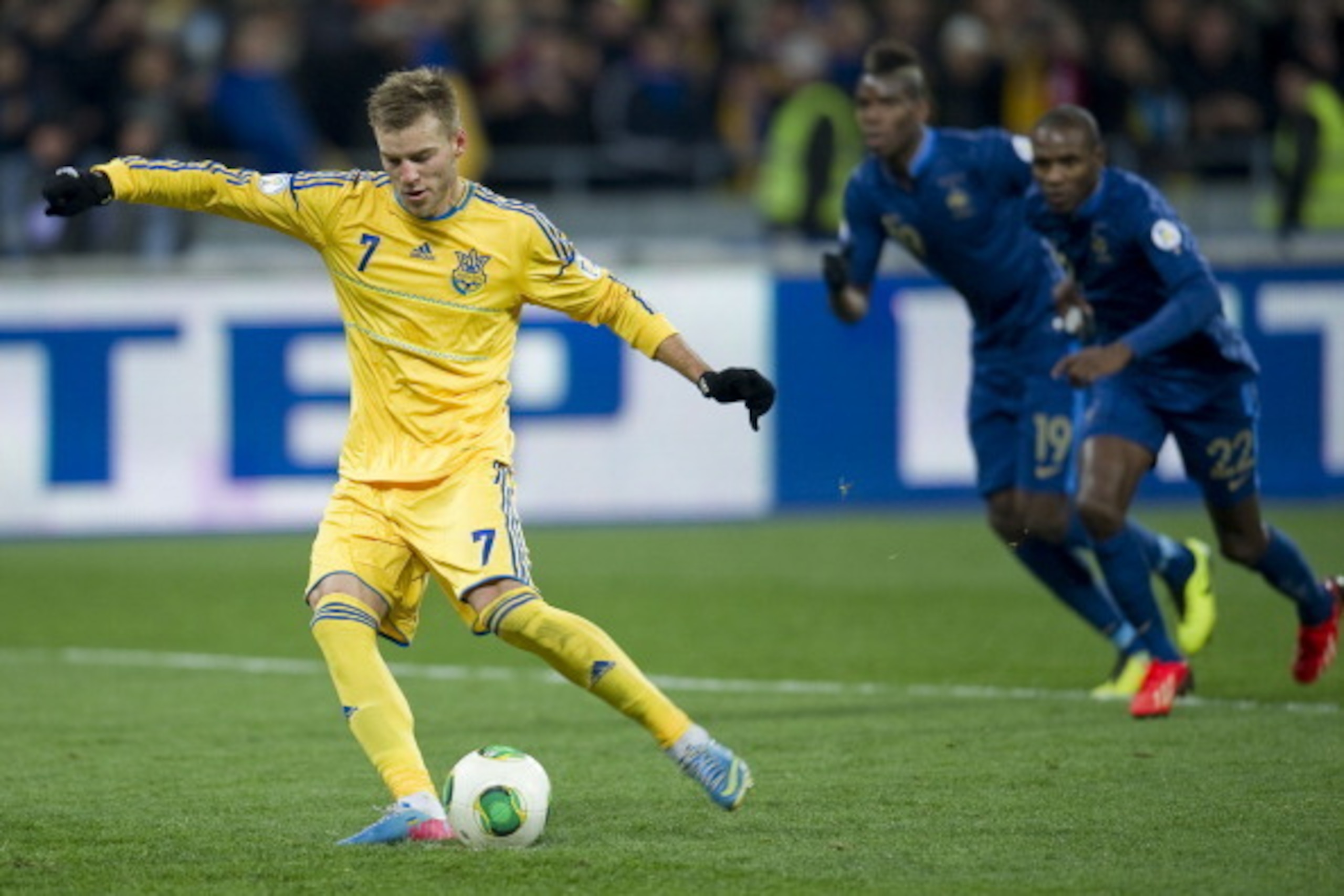 KIEV, UKRAINE - NOVEMBER 15: Ukraine's Andriy Yarmolenko scores the goal from penalty kick during the FIFA 2014 World Cup Qualifier Play-off First Leg soccer match between Ukraine and France at the Olympic Stadium on November 15, 2013 in Kiev, Ukraine.  (