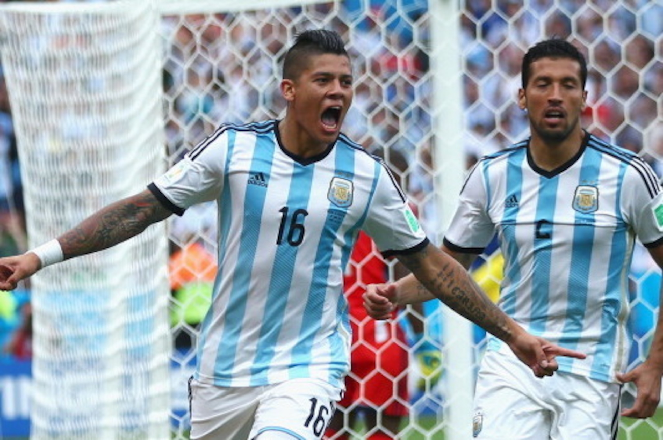 PORTO ALEGRE, BRAZIL - JUNE 25:  Marcos Rojo of Argentina celebrates scoring his team's third goal during the 2014 FIFA World Cup Brazil Group F match between Nigeria and Argentina at Estadio Beira-Rio on June 25, 2014 in Porto Alegre, Brazil.  (Photo by 