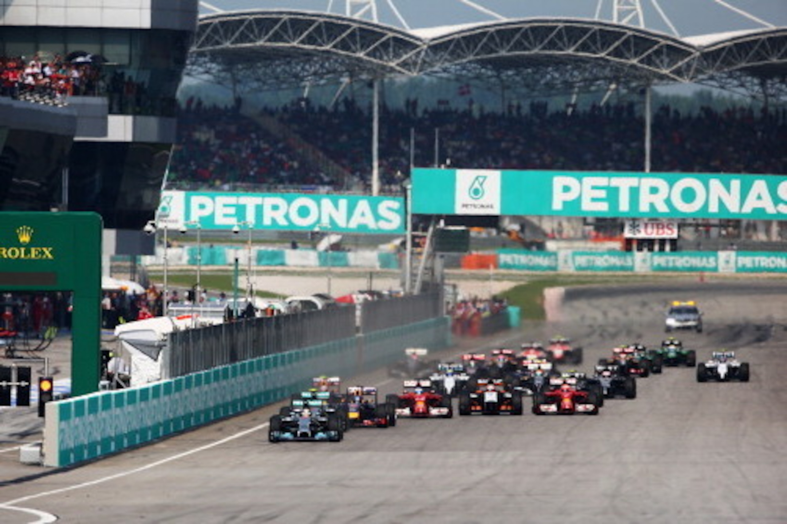 KUALA LUMPUR, MALAYSIA - MARCH 30: Lewis Hamilton of Great Britain and Mercedes GP leads at the start during the Malaysia Formula One Grand Prix at the Sepang Circuit on March 30, 2014 in Kuala Lumpur, Malaysia. (Photo by Paul Gilham/Getty Images) KUALA LUMPUR, MALAYSIA - MARCH 30: Lewis Hamilton of Great Britain and Mercedes GP leads at the start during the Malaysia Formula One Grand Prix at the Sepang Circuit on March 30, 2014 in Kuala Lumpur, Malaysia. (Photo by Paul Gilham/Getty Images)