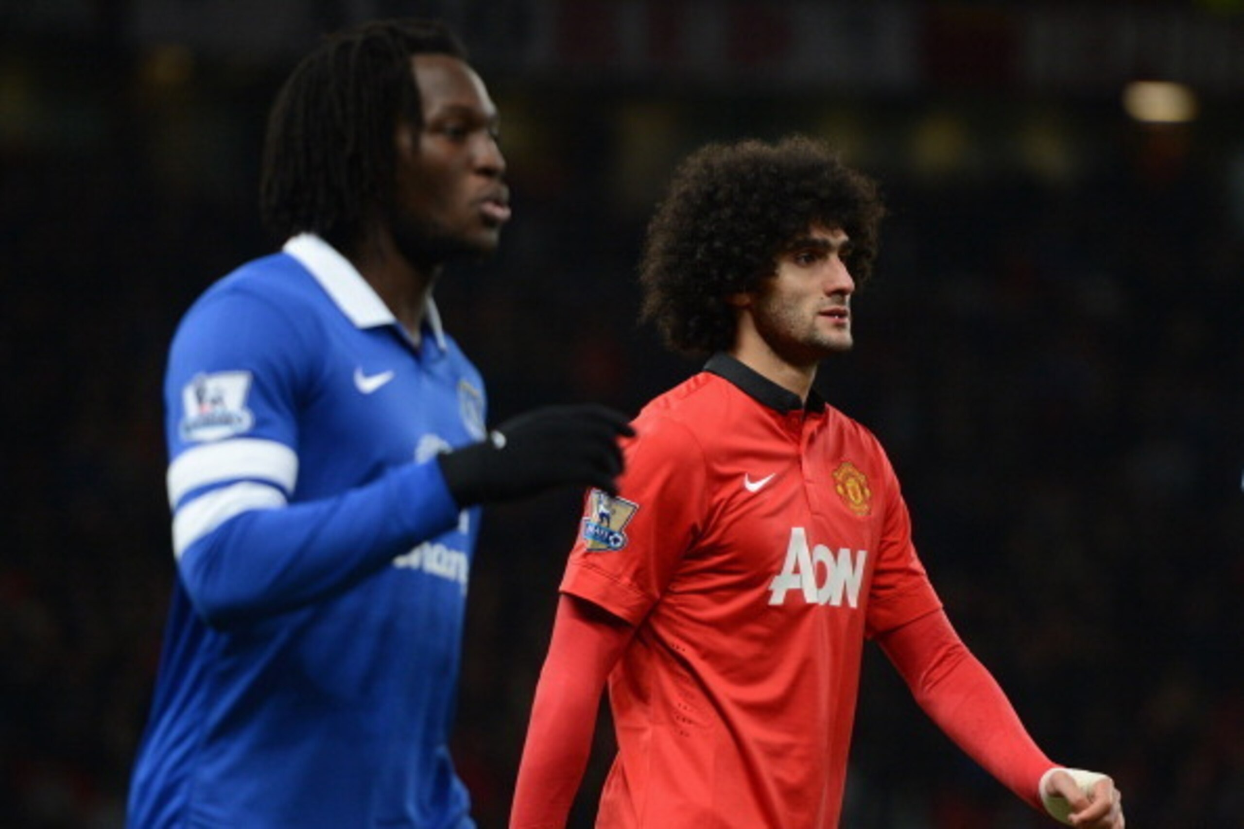 MANCHESTER, ENGLAND - DECEMBER 04:  Marouane Fellaini of Manchester United walks out prior to the Barclays Premier League match between Manchester United and Everton at Old Trafford on December 4, 2013 in Manchester, England.  (Photo by Michael Regan/Gett