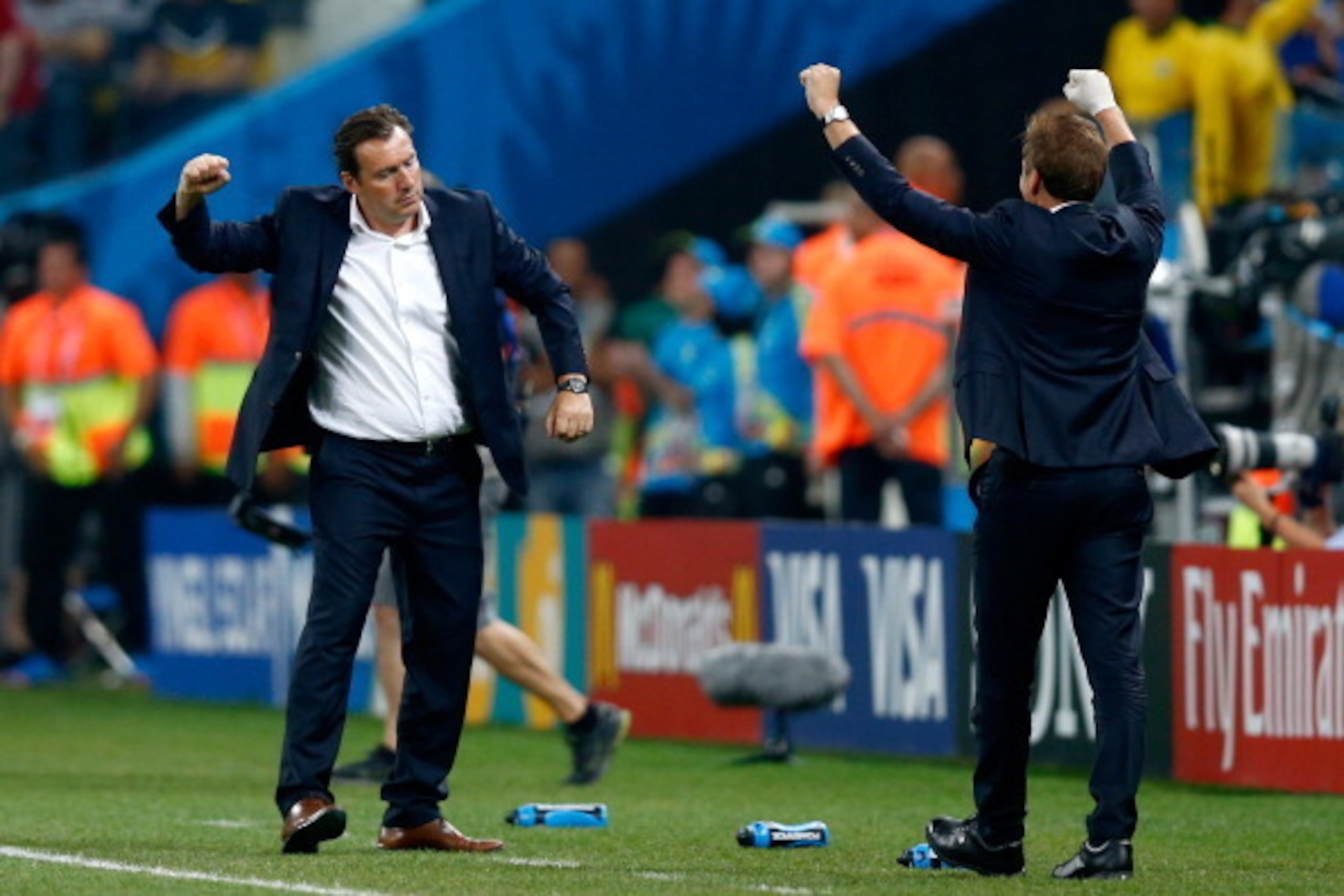 SAO PAULO, BRAZIL - JUNE 26:  Head coach Marc Wilmots of Belgium (L) celebrates victory after the 2014 FIFA World Cup Brazil Group H match between South Korea and Belgium at Arena de Sao Paulo on June 26, 2014 in Sao Paulo, Brazil.  (Photo by Phil Walter/