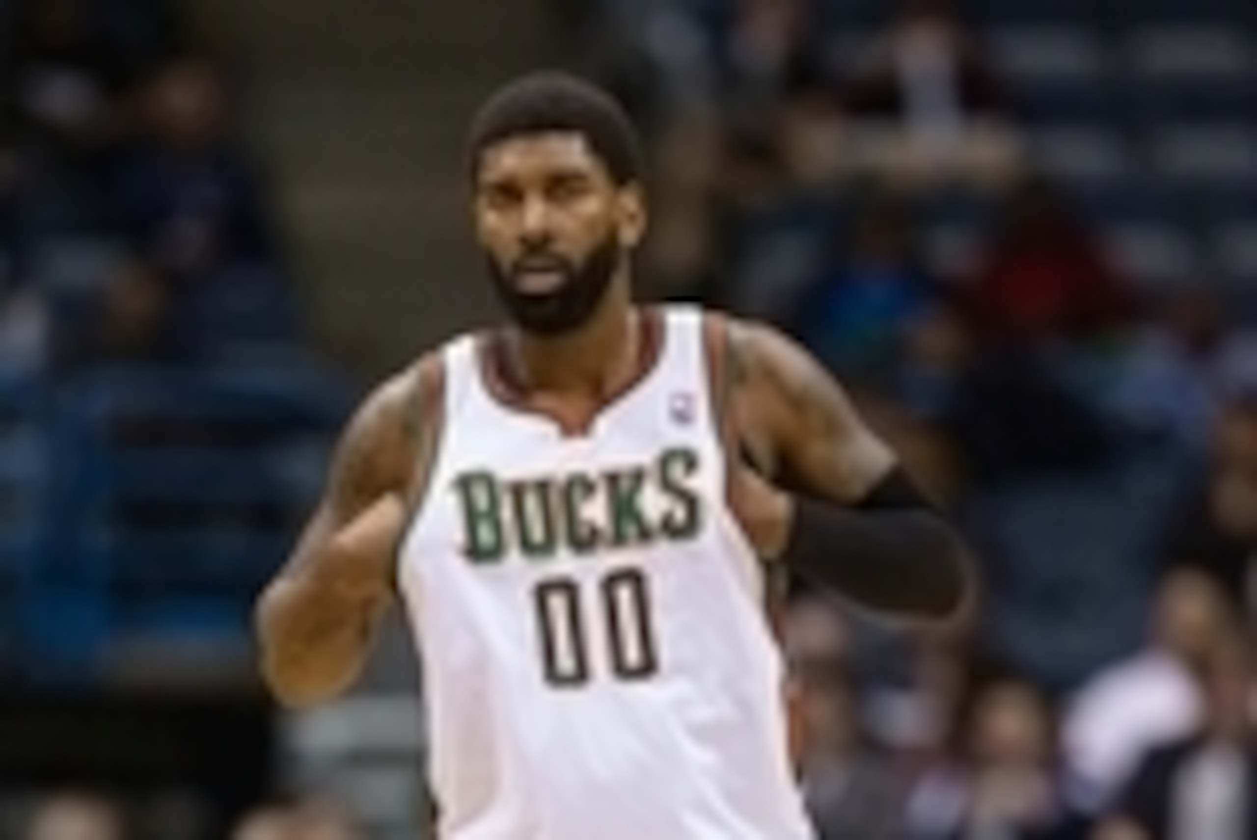 Mar 5, 2014; Milwaukee, WI, USA; Milwaukee Bucks guard O.J. Mayo (00) during the game against the Sacramento Kings at BMO Harris Bradley Center. Sacramento won 117-102.  Mandatory Credit: Jeff Hanisch-USA TODAY Sports