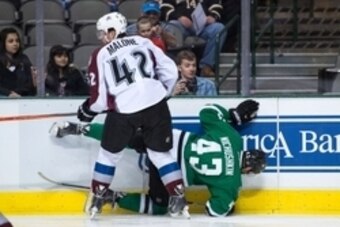 Sep 26, 2013; Dallas, TX, USA; Colorado Avalanche center Brad Malone (42) checks Dallas Stars right wing Valeri Nichushkin (43) during the game at American Airlines Center. The Stars defeated the Avalanche 5-1. Mandatory Credit: Jerome Miron-USA TODAY Spo