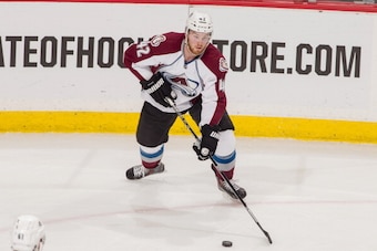 ST. PAUL, MN - APRIL 24: Brad Malone #42 of the Colorado Avalanche handles the puck against the Minnesota Wild during Game Four of the First Round of the 2014 Stanley Cup Playoffs on April 24, 2014 at the Xcel Energy Center in St. Paul, Minnesota. (Photo 