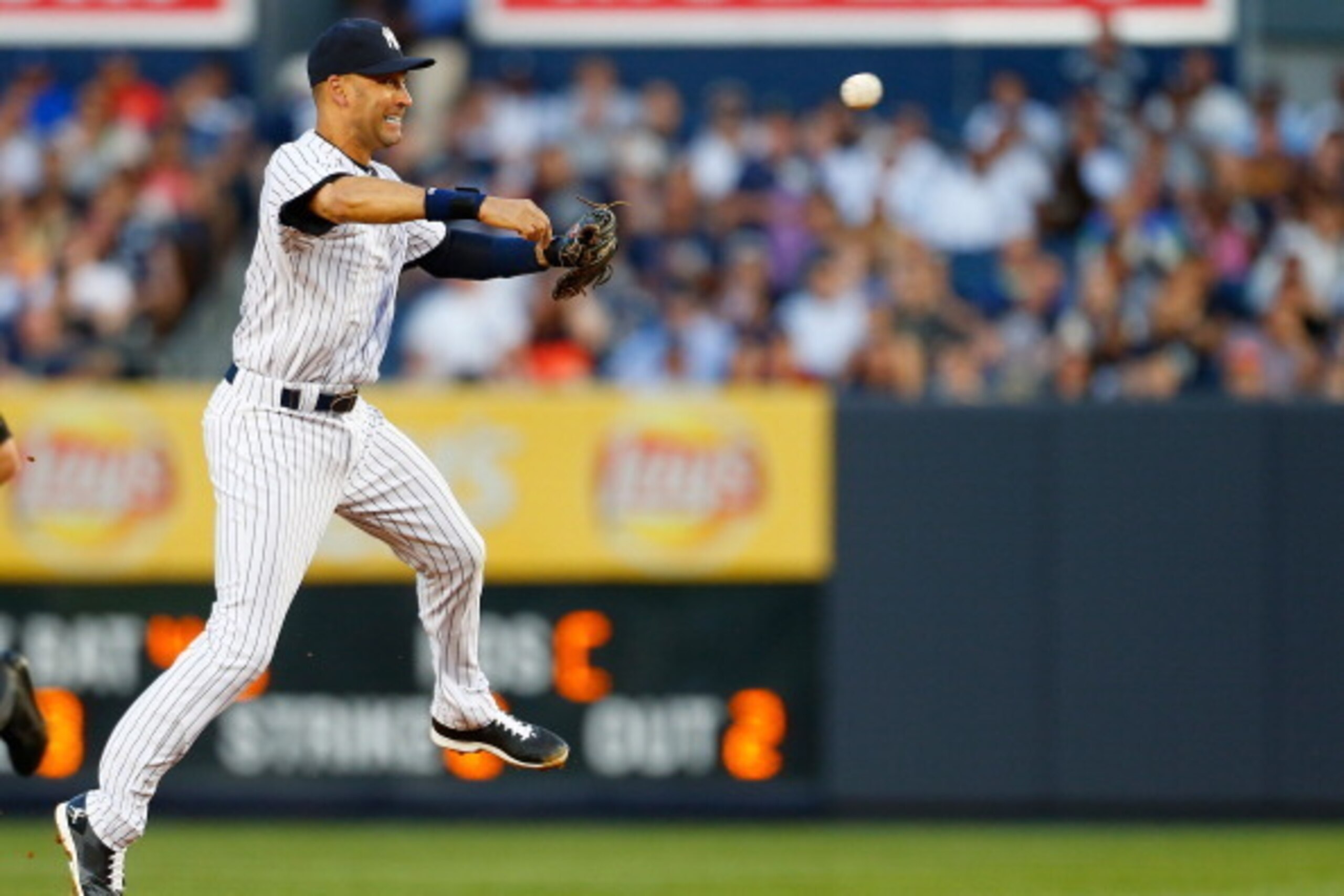 NEW YORK, NY - JUNE 20:  Derek Jeter #2 of the New York Yankees fields a ground ball but is unable to complete the play in the third inning against the Baltimore Orioles at Yankee Stadium on June 20, 2014 in the Bronx borough of New York City.  (Photo by 