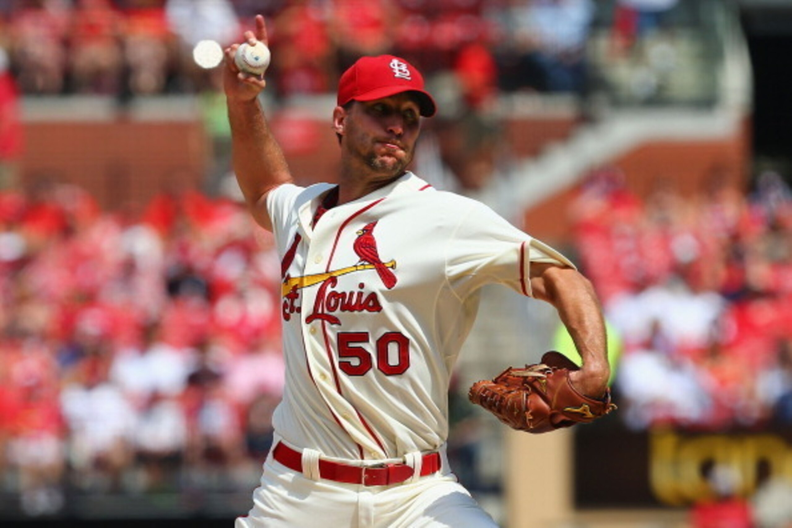 ST. LOUIS, MO - JUNE 21: Starter Adam Wainwright #50 of the St. Louis Cardinals pitches against the Philadelphia Phillies in the first inning at Busch Stadium on June 21, 2014 in St. Louis, Missouri.  (Photo by Dilip Vishwanat/Getty Images)