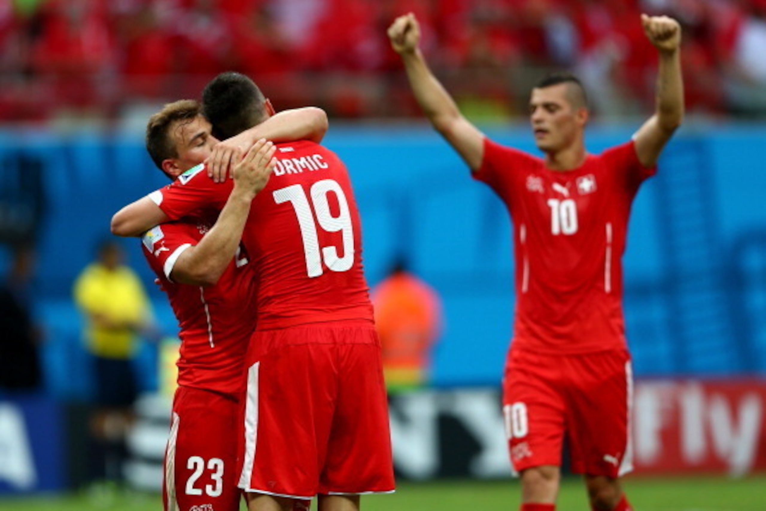 MANAUS, BRAZIL - JUNE 25:  Xherdan Shaqiri of Switzerland (L) celebrates  scoring  his team's third goal and completes his hat trick during the 2014 FIFA World Cup Brazil Group E match between Honduras and Switzerland at Arena Amazonia on June 25, 2014 in