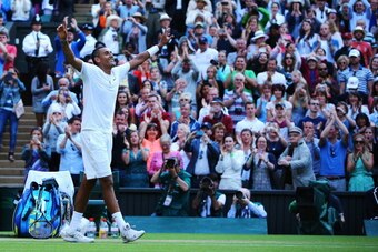 LONDON, ENGLAND - JULY 01:  Nick Kyrgios of Australia celebrates match point and winning his Gentlemen's Singles fourth round match against Rafael Nadal of Spain on day eight of the Wimbledon Lawn Tennis Championships at the All England Lawn Tennis and Cr