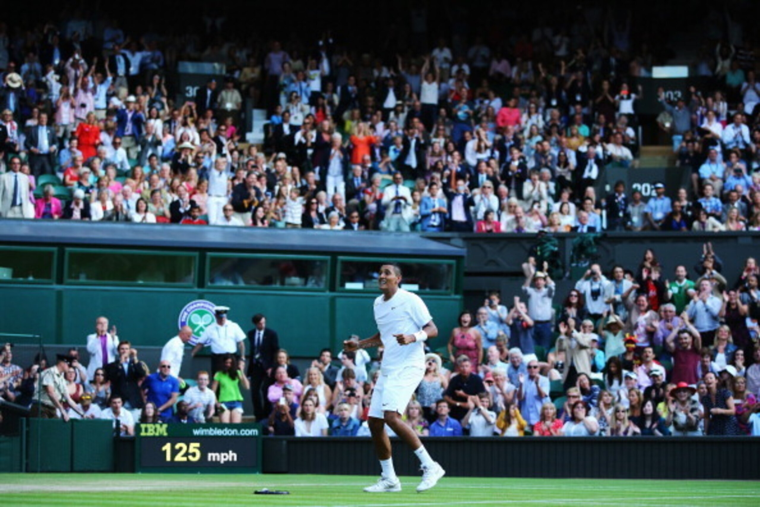 LONDON, ENGLAND - JULY 01:  Nick Kyrgios of Australia celebrates match point and winning his Gentlemen's Singles fourth round match against Rafael Nadal of Spain on day eight of the Wimbledon Lawn Tennis Championships at the All England Lawn Tennis and Cr