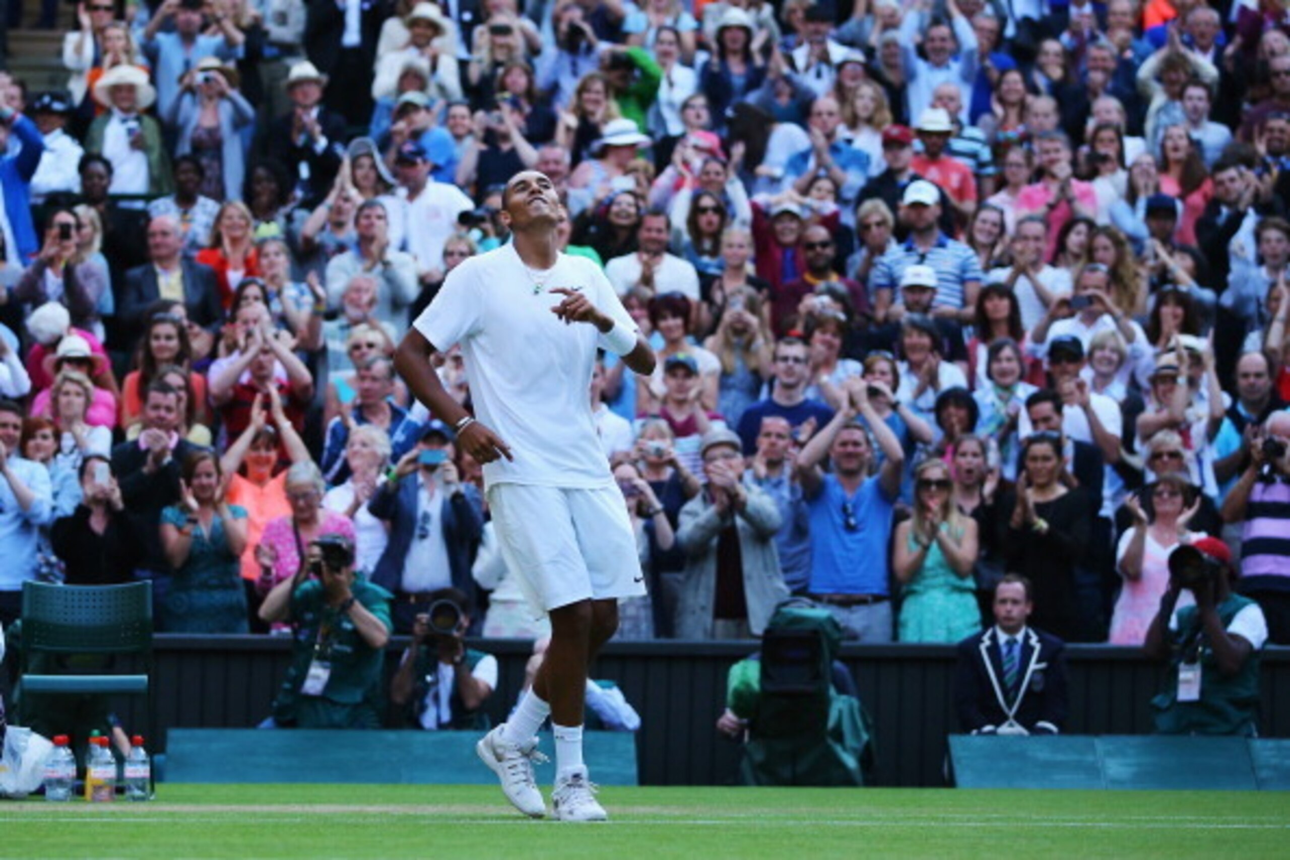 LONDON, ENGLAND - JULY 01:  Nick Kyrgios of Australia celebrates match point and winning his Gentlemen's Singles fourth round match against Rafael Nadal of Spain on day eight of the Wimbledon Lawn Tennis Championships at the All England Lawn Tennis and Cr