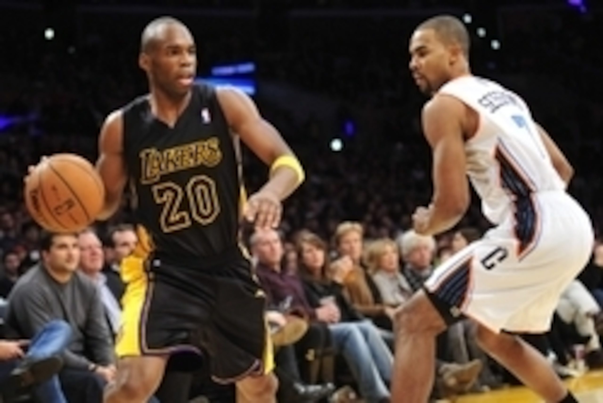 January 31, 2014; Los Angeles, CA, USA; Los Angeles Lakers shooting guard Jodie Meeks (20) controls the ball against the defense of Charlotte Bobcats point guard Ramon Sessions (7) during the second half at Staples Center. Mandatory Credit: Gary A. Vasque January 31, 2014; Los Angeles, CA, USA; Los Angeles Lakers shooting guard Jodie Meeks (20) controls the ball against the defense of Charlotte Bobcats point guard Ramon Sessions (7) during the second half at Staples Center. Mandatory Credit: Gary A. Vasque