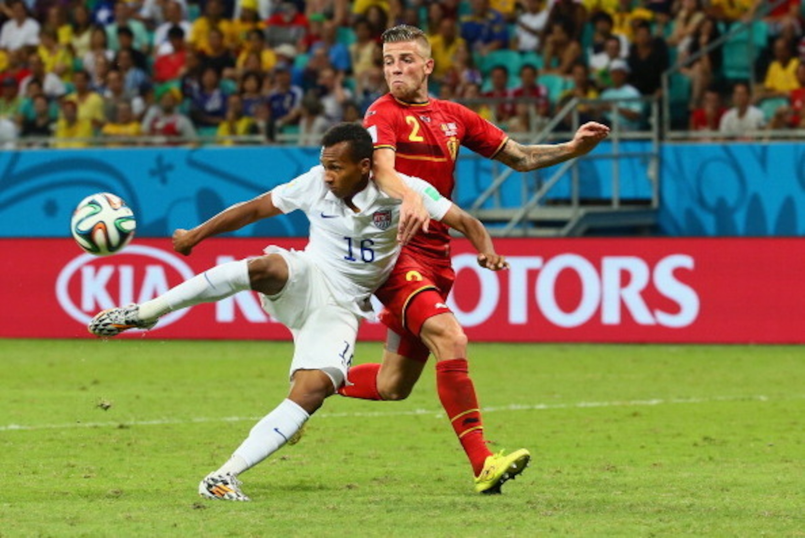 SALVADOR, BRAZIL - JULY 01: Julian Green of the United States scores his team's first goal in extra time against Toby Alderweireld of Belgium during the 2014 FIFA World Cup Brazil Round of 16 match between Belgium and the United States at Arena Fonte Nova