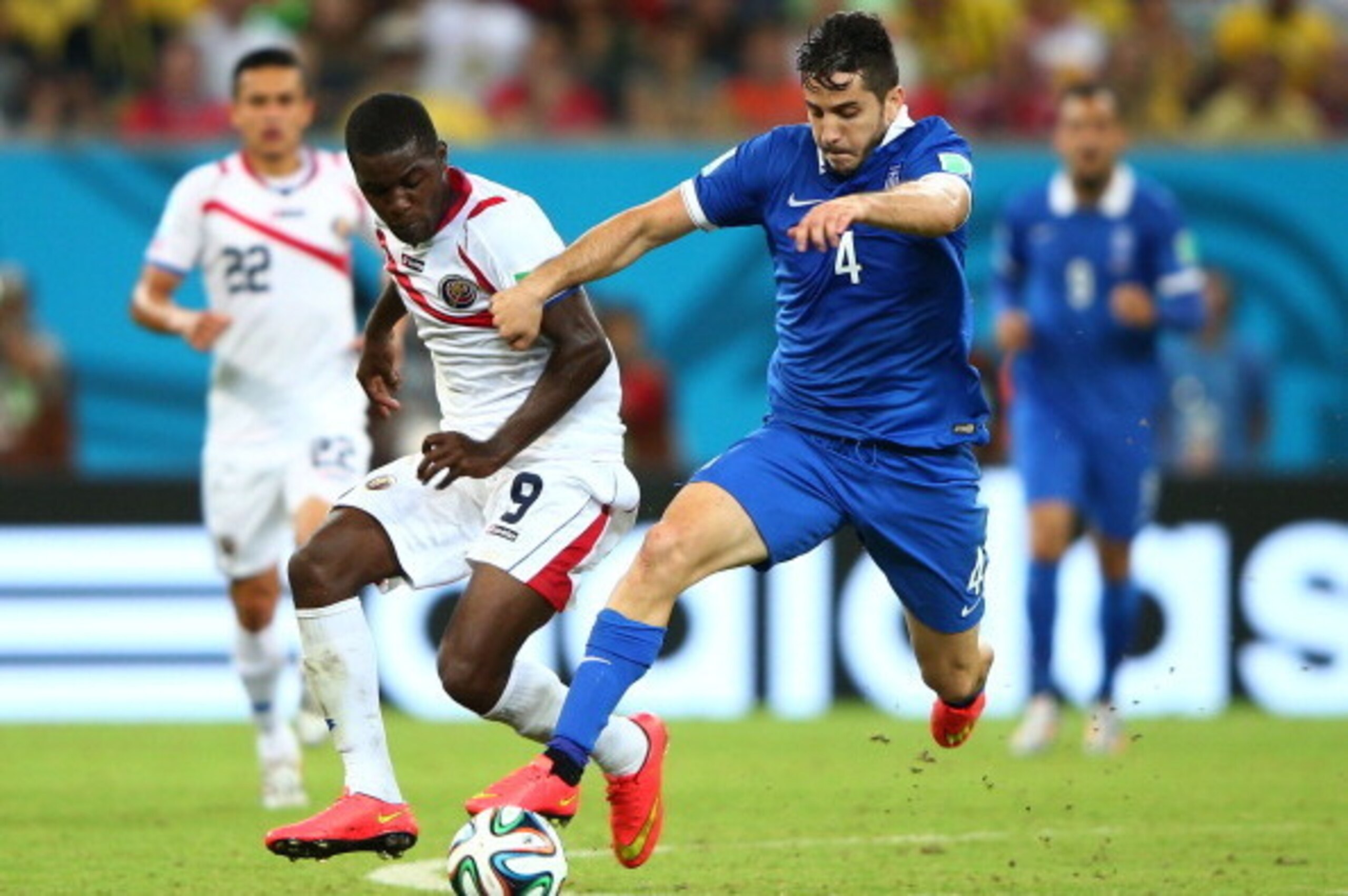 RECIFE, BRAZIL - JUNE 29:  Joel Campbell of Costa Rica and Konstantinos Manolas of Greece compete for the ball during the 2014 FIFA World Cup Brazil Round of 16 match between Costa Rica and Greece at Arena Pernambuco on June 29, 2014 in Recife, Brazil.  (