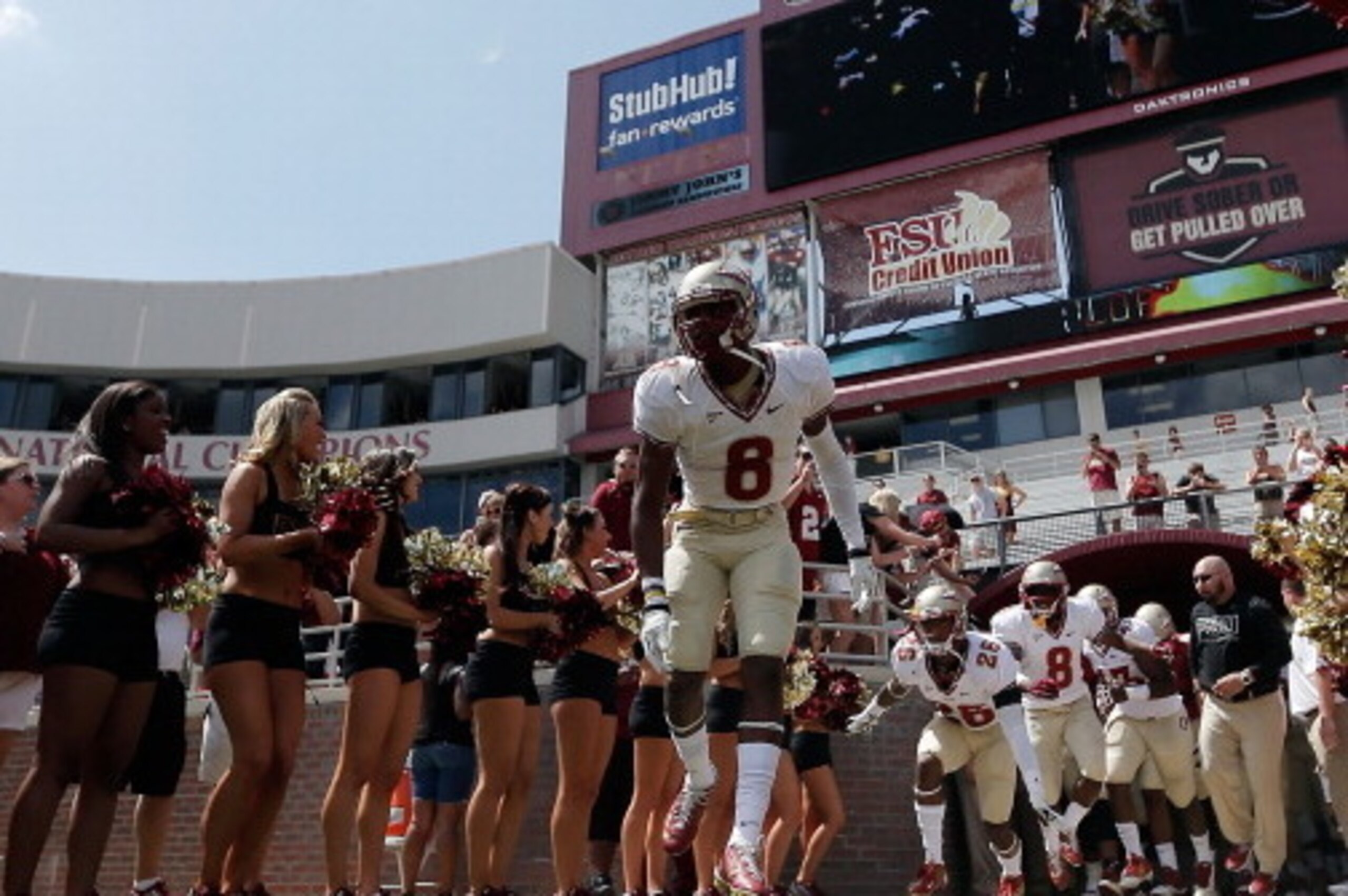 TALLAHASSEE, FL - APRIL 12:  Members of the Florida State Seminoles take the field for the Garnet and Gold spring game at Doak Campbell Stadium on April 12, 2014 in Tallahassee, Florida.  (Photo by Stacy Revere/Getty Images)
