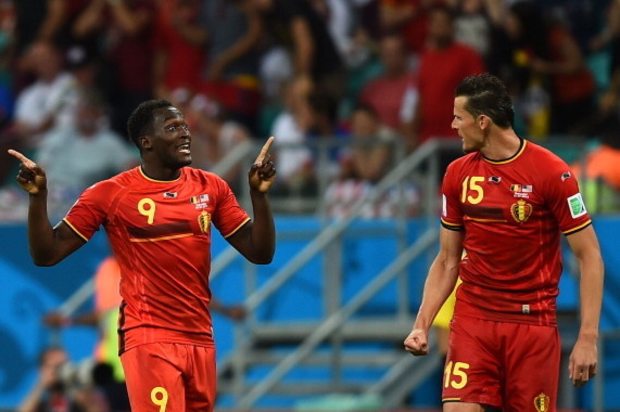 SALVADOR, BRAZIL - JULY 01:  Romelu Lukaku of Belgium celebrates scoring his team's second goal in extra time with Daniel Van Buyten during the 2014 FIFA World Cup Brazil Round of 16 match between Belgium and the United States at Arena Fonte Nova on July 
