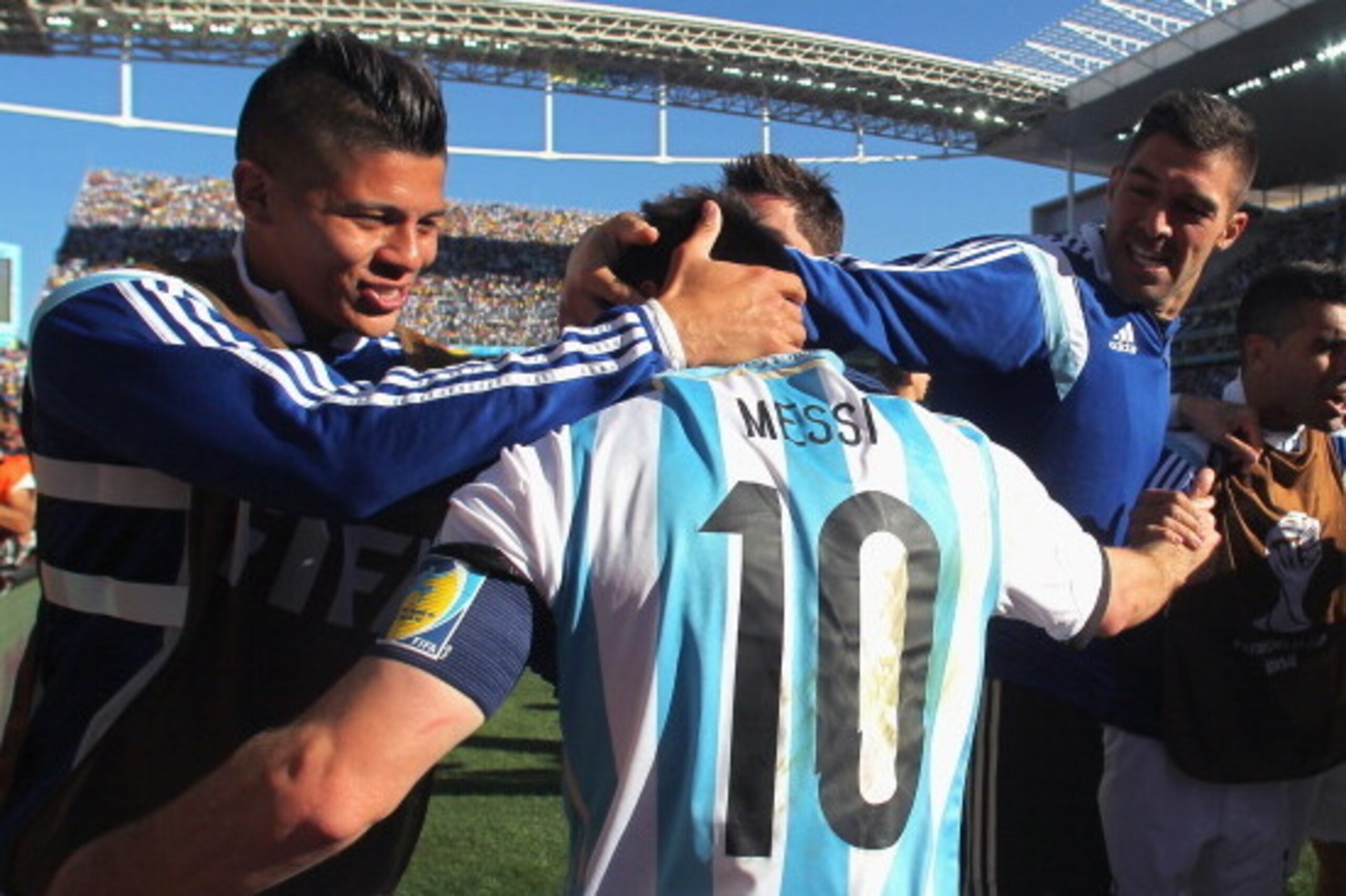 SAO PAULO, BRAZIL - JULY 01:  Lionel Messi of Argentina celebrates with teammates defeating Switzerland 1-0 in extra time during the 2014 FIFA World Cup Brazil Round of 16 match between Argentina and Switzerland at Arena de Sao Paulo on July 1, 2014 in Sa