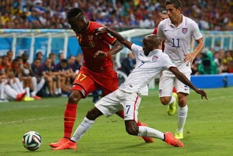 SALVADOR, BRAZIL - JULY 01: DaMarcus Beasley of the United States challenges Divock Origi of Belgium during the 2014 FIFA World Cup Brazil Round of 16 match between Belgium and the United States at Arena Fonte Nova on July 1, 2014 in Salvador, Brazil.  (P