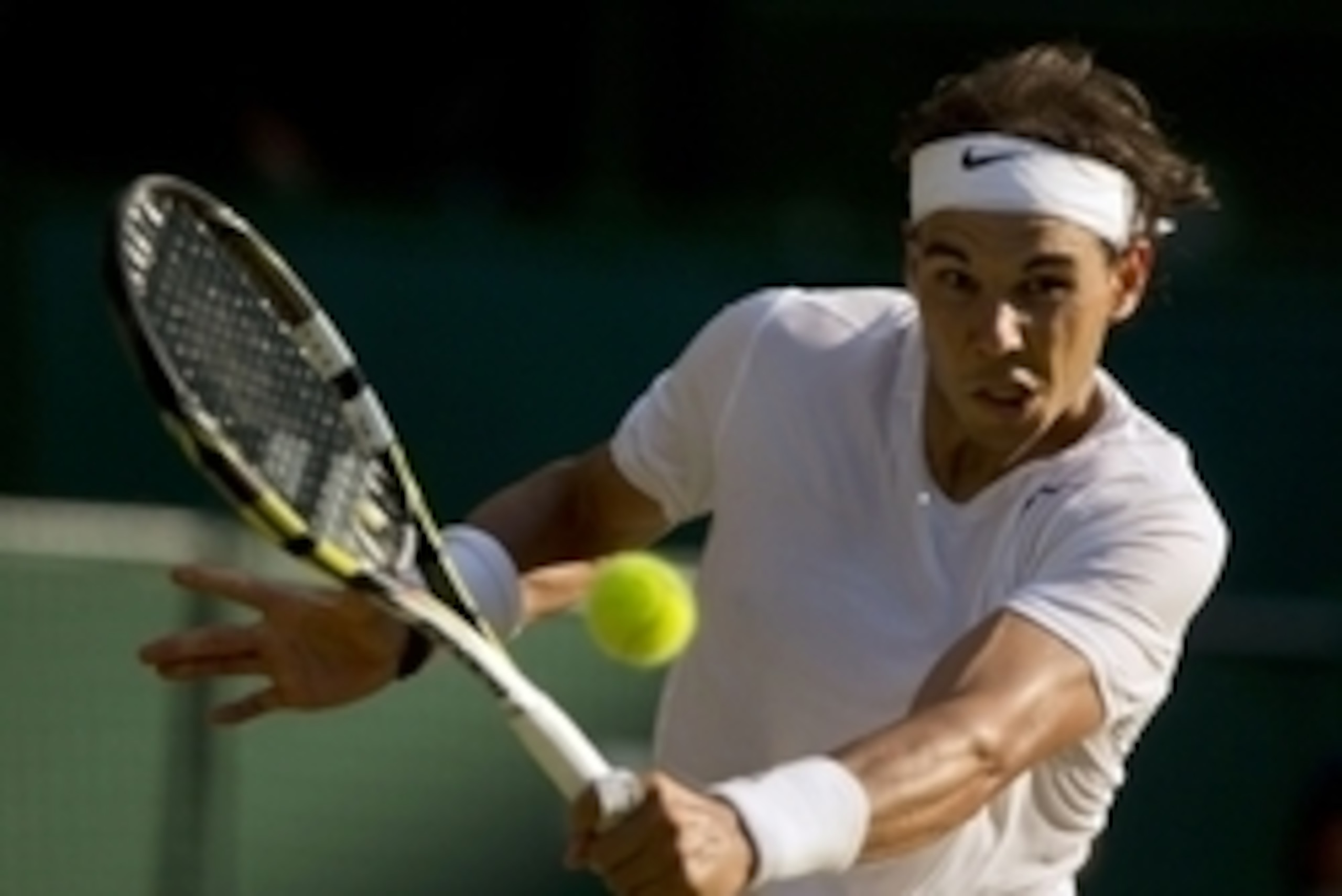 Jul 1, 2014; London, United Kingdom; Rafael Nadal (ESP) in action during his match against Nick Kyrgios (AUS) on day eight of the 2014 Wimbledon Championships at the All England Lawn and Tennis Club. Mandatory Credit: Susan Mullane-USA TODAY Sports