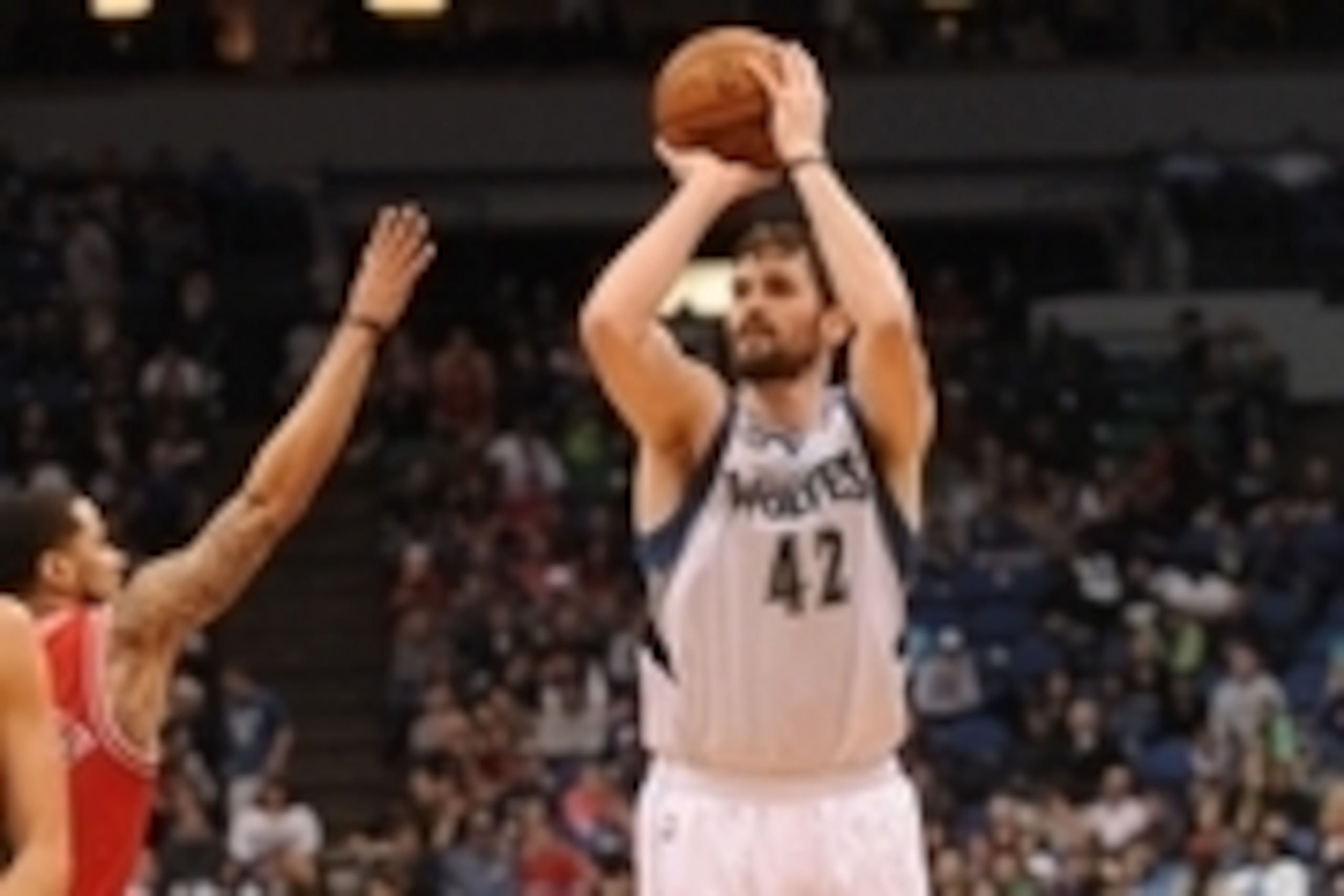 Apr 9, 2014; Minneapolis, MN, USA;  Minnesota Timberwolves forward Kevin Love (42) pulls up to shoot a three pointer in the fourth quarter against the Chicago Bulls at Target Center.  The Bulls defeated the Wolves 102-87.  Mandatory Credit: Marilyn Indahl
