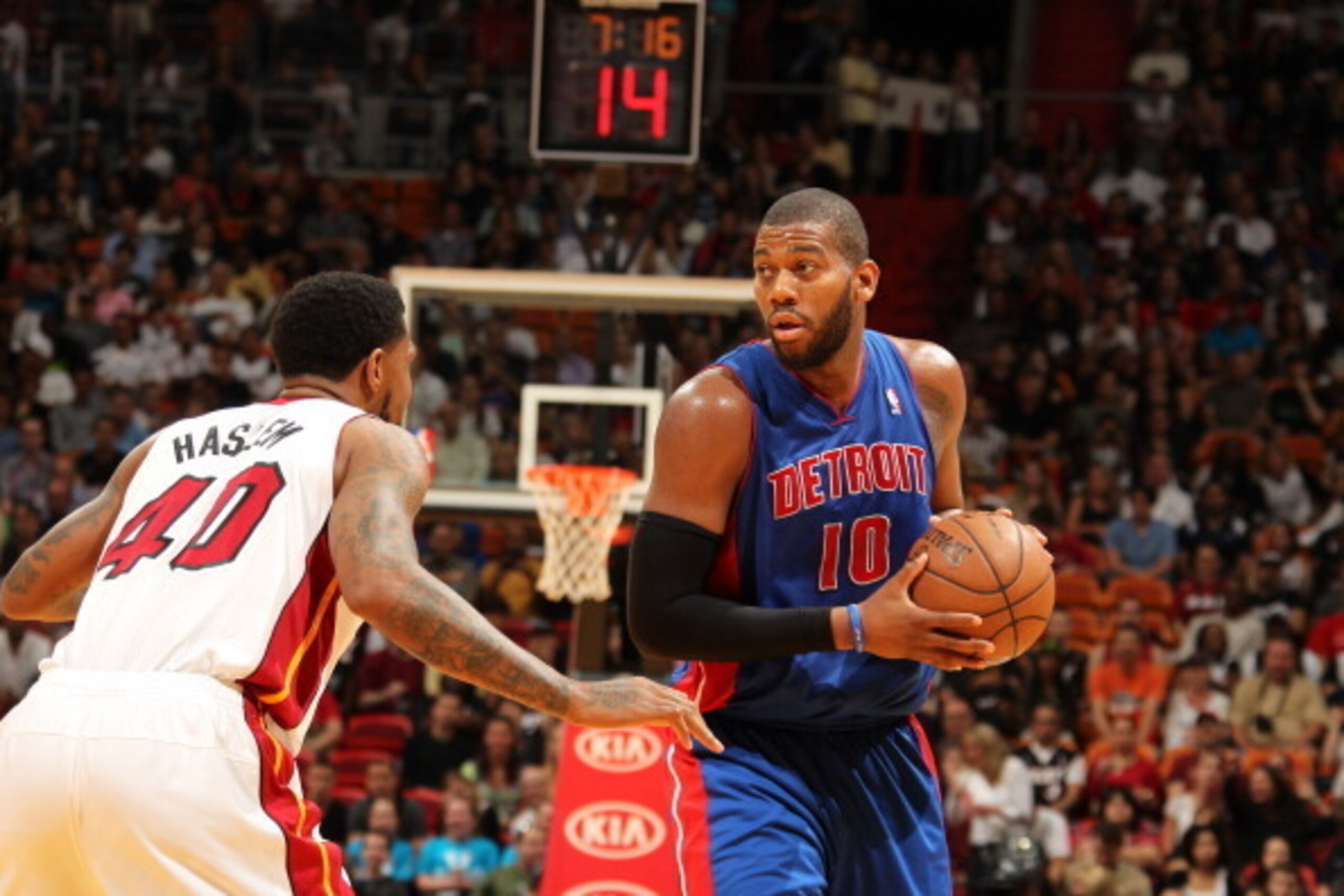 MIAMI, FL - MARCH 22: Greg Monroe #10 of the Detroit Pistons controls the ball against Udonis Haslem #40 of the Miami Heat on March 22, 2013 at American Airlines Arena in Miami, Florida. NOTE TO USER: User expressly acknowledges and agrees that, by downlo