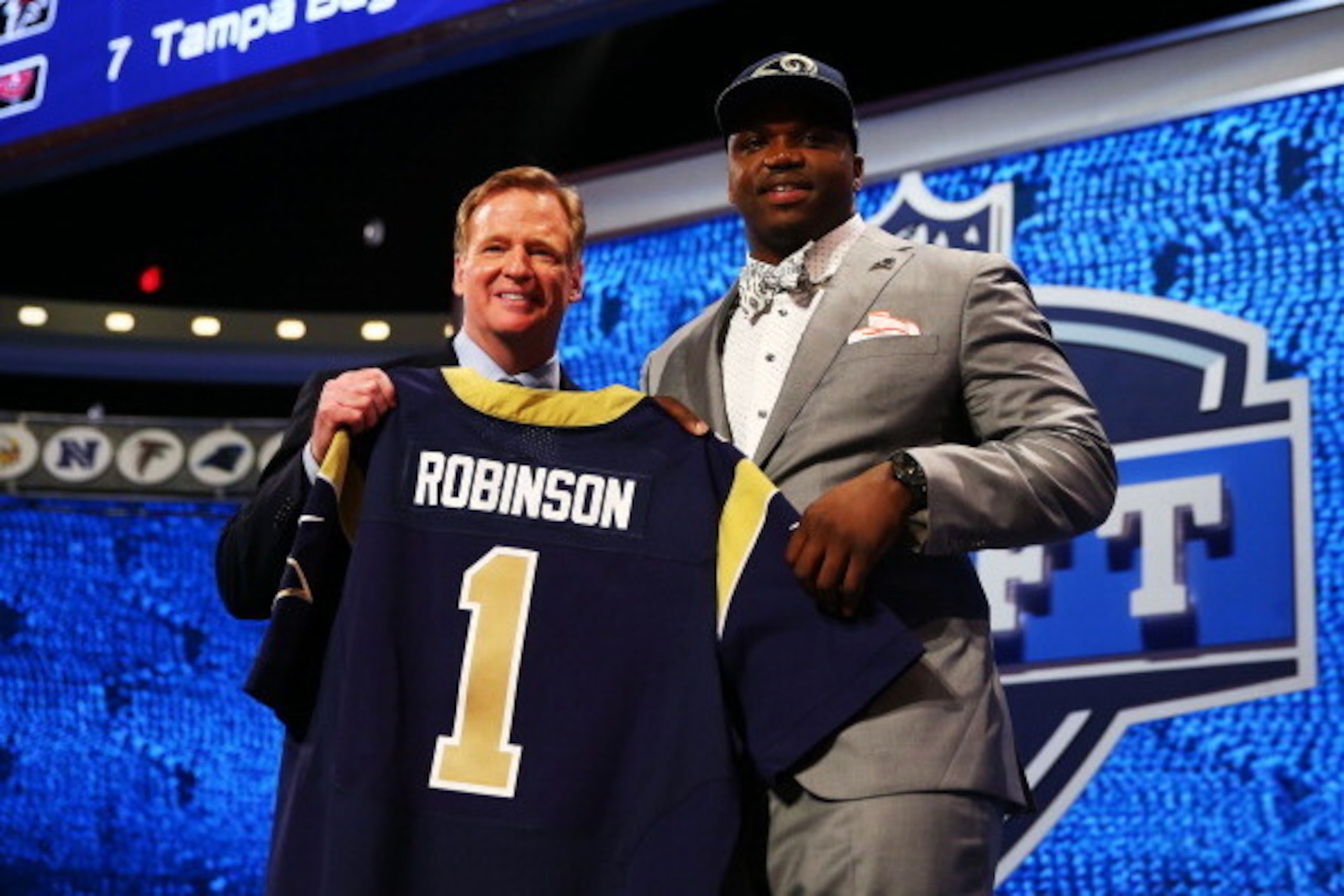 NEW YORK, NY - MAY 08:  Greg Robinson of the Auburn Tigers poses with NFL Commissioner Roger Goodell after he was picked #2 overall by the during the first round of the 2014 NFL Draft at Radio City Music Hall on May 8, 2014 in New York City.  (Photo by El