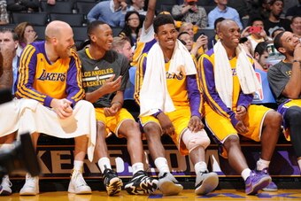 LOS ANGELES, CA - MARCH 25: The Los Angeles Lakers bench look on during a game against the New York Knicks at Staples Center on March 25, 2014 in Los Angeles, California. NOTE TO USER: User expressly acknowledges and agrees that, by downloading and/or usi