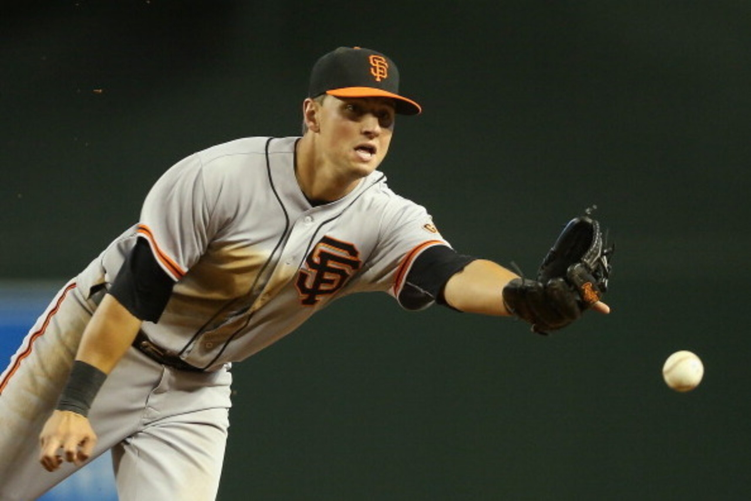 PHOENIX, AZ - JUNE 22: Infielder Joe Panik #12 of the San Francisco Giants in action during the MLB game against the Arizona Diamondbacks at Chase Field on June 22, 2014 in Phoenix, Arizona. The Giants defeated the Diamondbacks 4-1. (Photo by Christian PHOENIX, AZ - JUNE 22: Infielder Joe Panik #12 of the San Francisco Giants in action during the MLB game against the Arizona Diamondbacks at Chase Field on June 22, 2014 in Phoenix, Arizona. The Giants defeated the Diamondbacks 4-1. (Photo by Christian