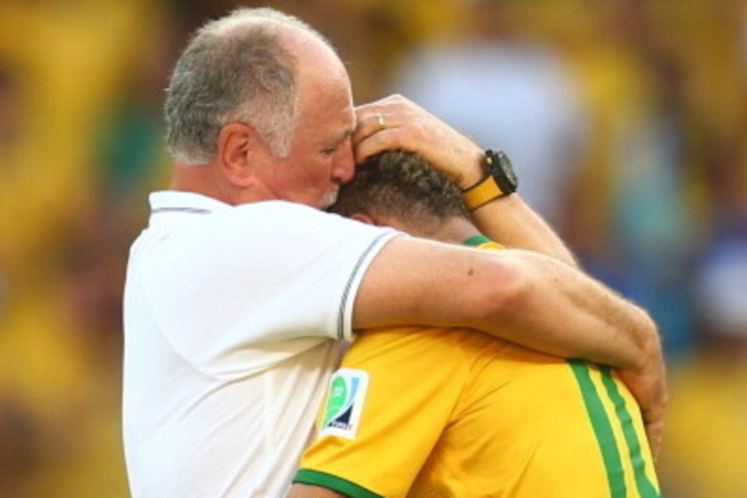 BELO HORIZONTE, BRAZIL - JUNE 28:  Head coach Luiz Felipe Scolari of Brazil celebrates with Neymar after defeating Chile in a penalty shootout during the 2014 FIFA World Cup Brazil round of 16 match between Brazil and Chile at Estadio Mineirao on June 28,