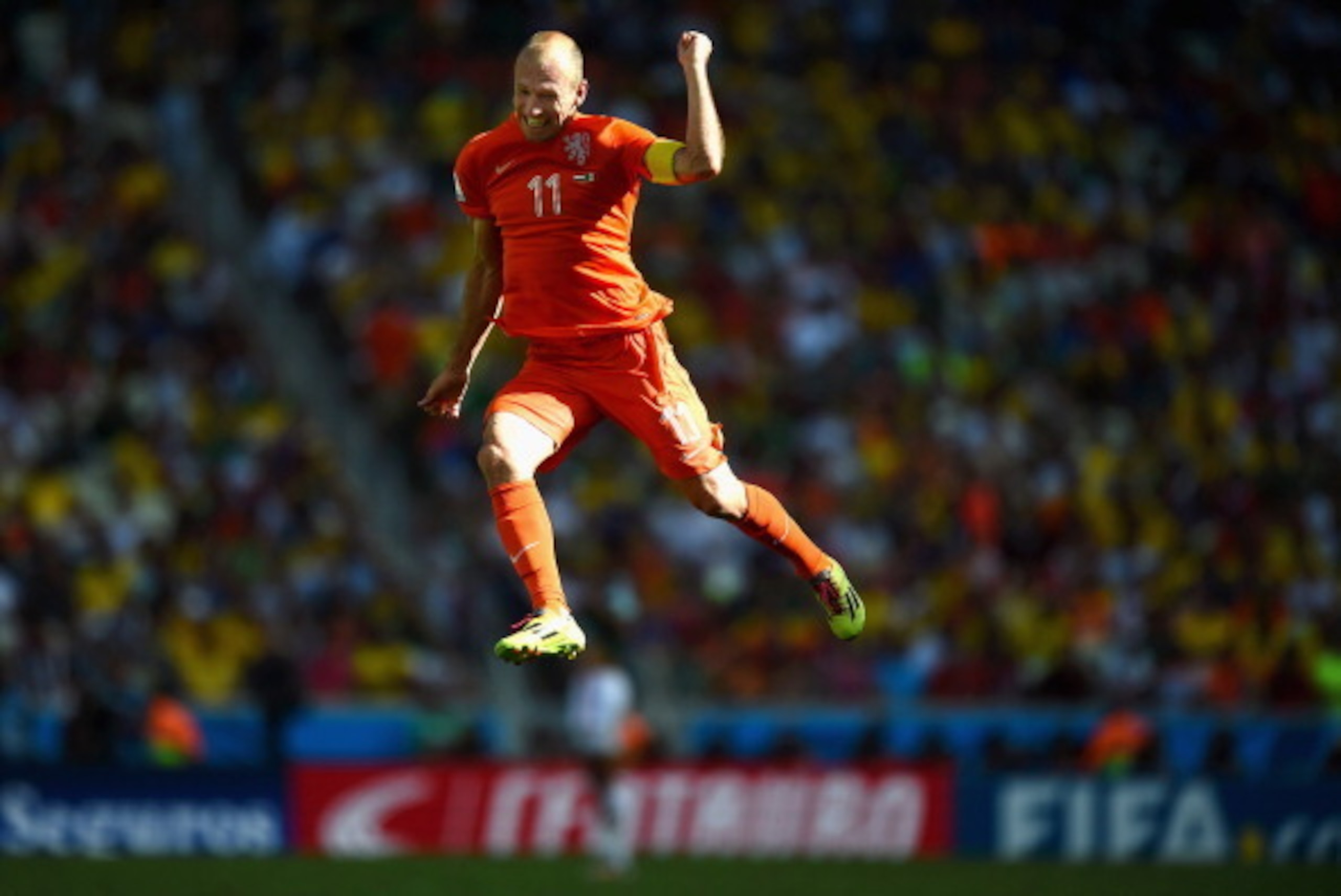FORTALEZA, BRAZIL - JUNE 29:  Arjen Robben of the Netherlands celebrates after defeating Mexico 2-1 during the 2014 FIFA World Cup Brazil Round of 16 match between Netherlands and Mexico at Castelao on June 29, 2014 in Fortaleza, Brazil.  (Photo by Lauren