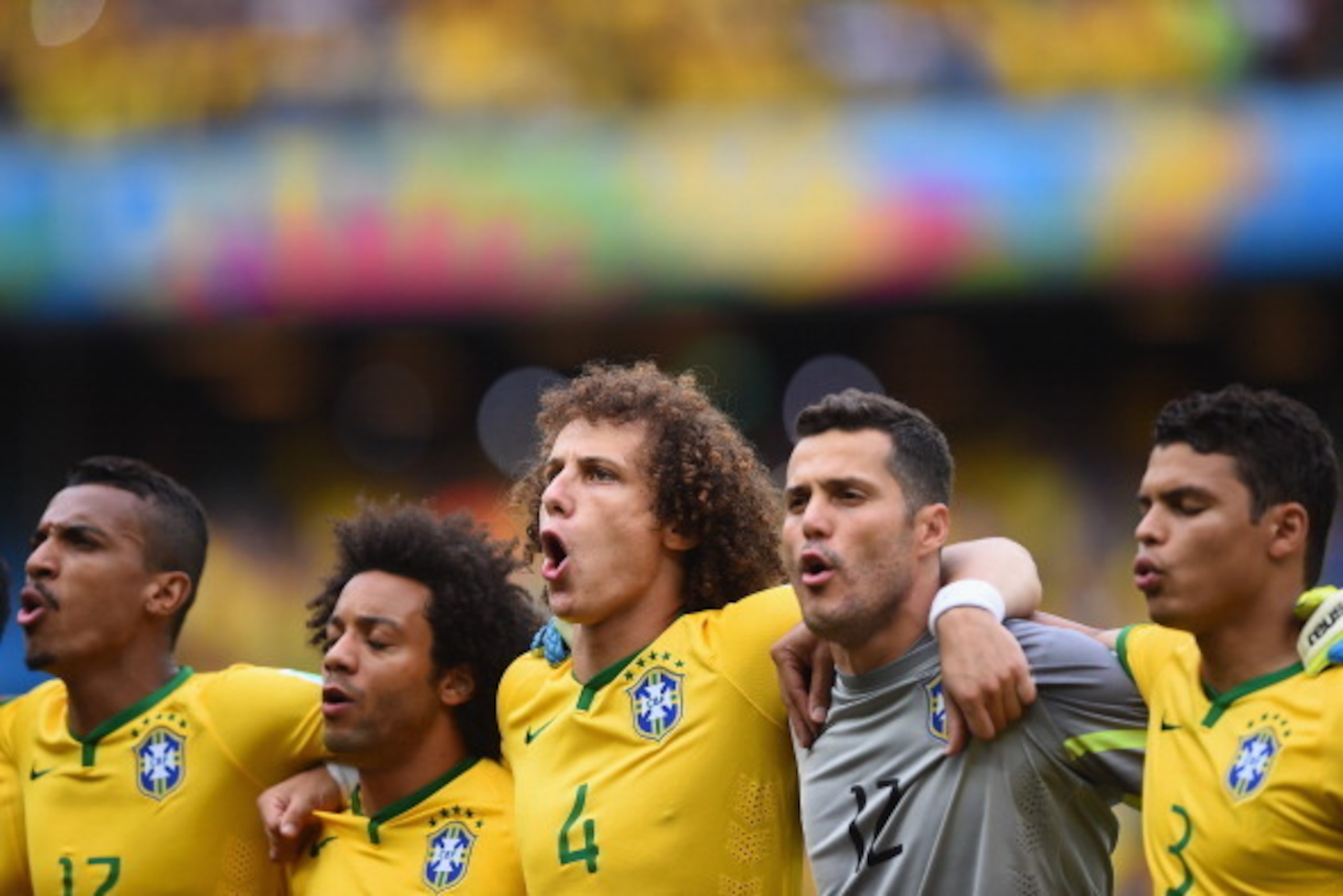 FORTALEZA, BRAZIL - JUNE 17:  (L-R) Luiz Gustavo of Brazil, Marcelo, David Luiz, Julio Cesar and Thiago Silva sing the National Anthem before the 2014 FIFA World Cup Brazil Group A match between Brazil and Mexico at Castelao on June 17, 2014 in Fortaleza,
