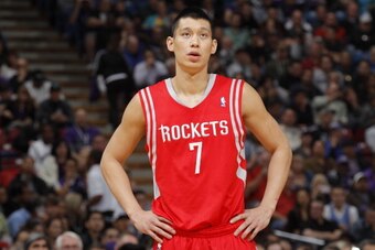 SACRAMENTO, CA - FEBRUARY 25: Jeremy Lin #7 of the Houston Rockets in a game against the Sacramento Kings on February 25, 2014 at Sleep Train Arena in Sacramento, California. NOTE TO USER: User expressly acknowledges and agrees that, by downloading and or