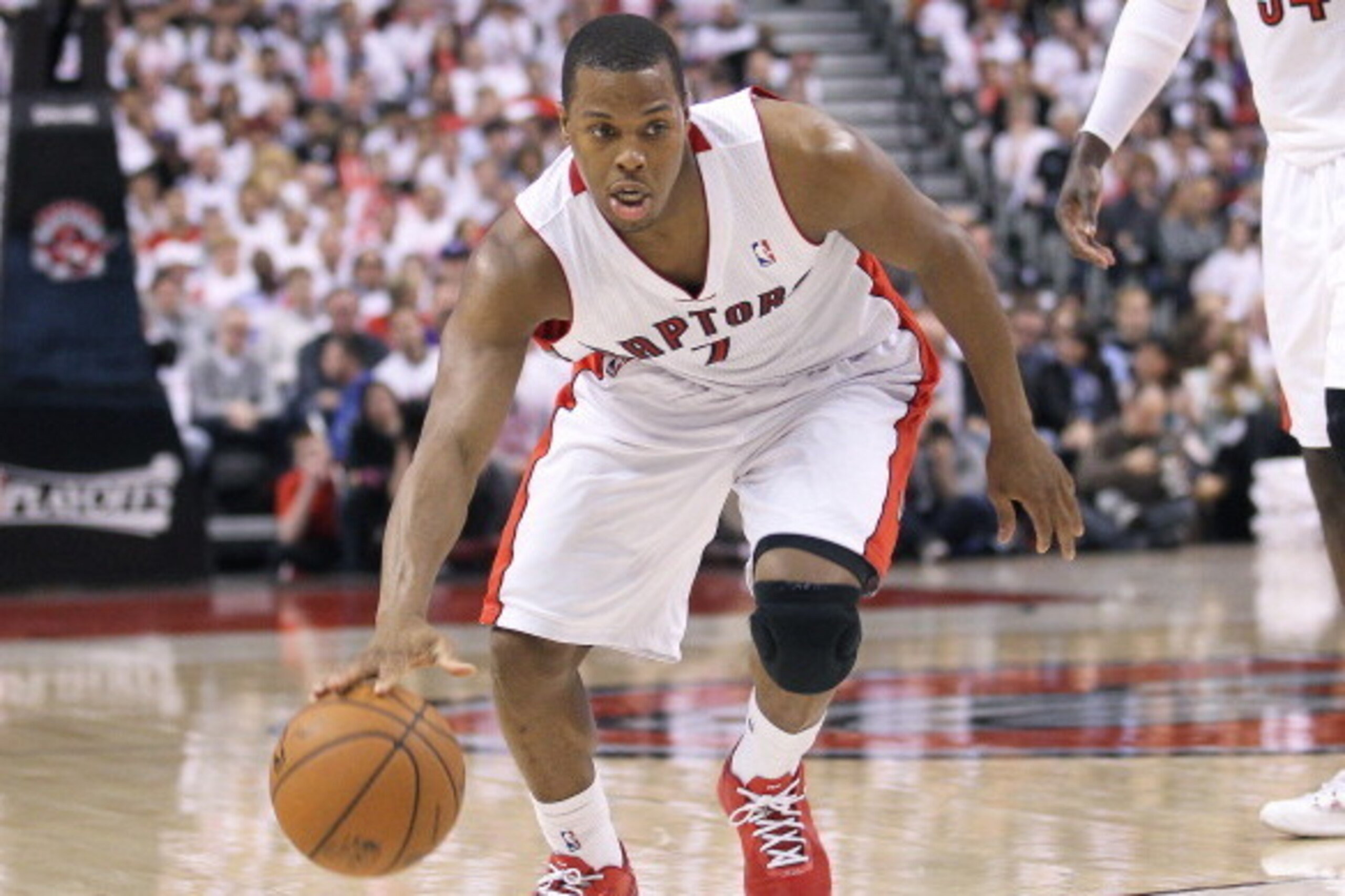 TORONTO, ON - APRIL 19:  Kyle Lowry #7 of the Toronto Raptors plays against the Brooklyn Nets in Game One of the NBA Eastern Conference play-off at the Air Canada Centre on April 19, 2014 in Toronto, Ontario, Canada. The Nets defeated the Raptors 94-87 to