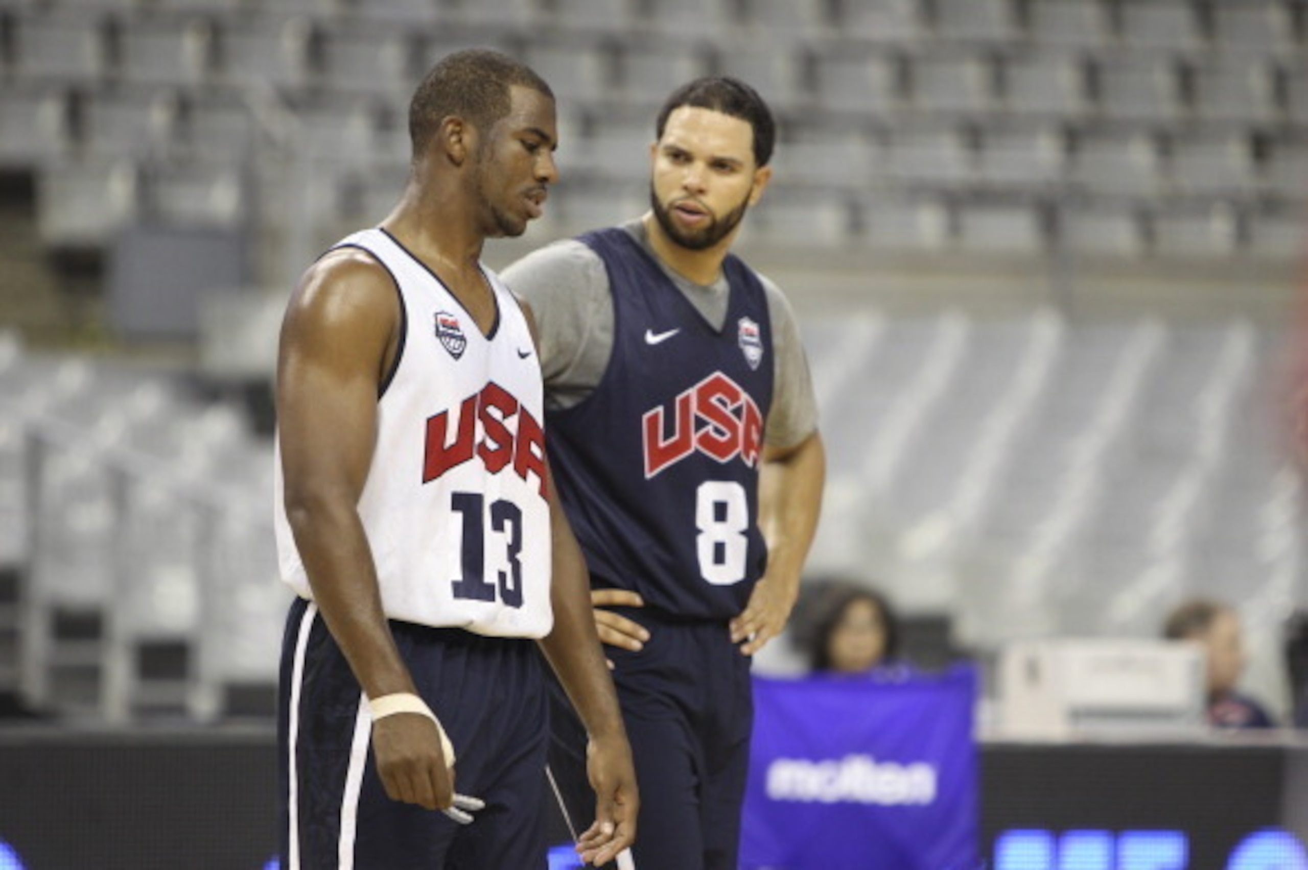 BARCELONA, SPAIN - JULY 21: Chris Paul # 13 and Deron Williams # 8 of the US Men's Senior National team are talking about plays during practice at Palau Sant Jordi II arena in Barcelona, Spain on July 21, 2012. NOTE TO USER: User expressly acknowledges an