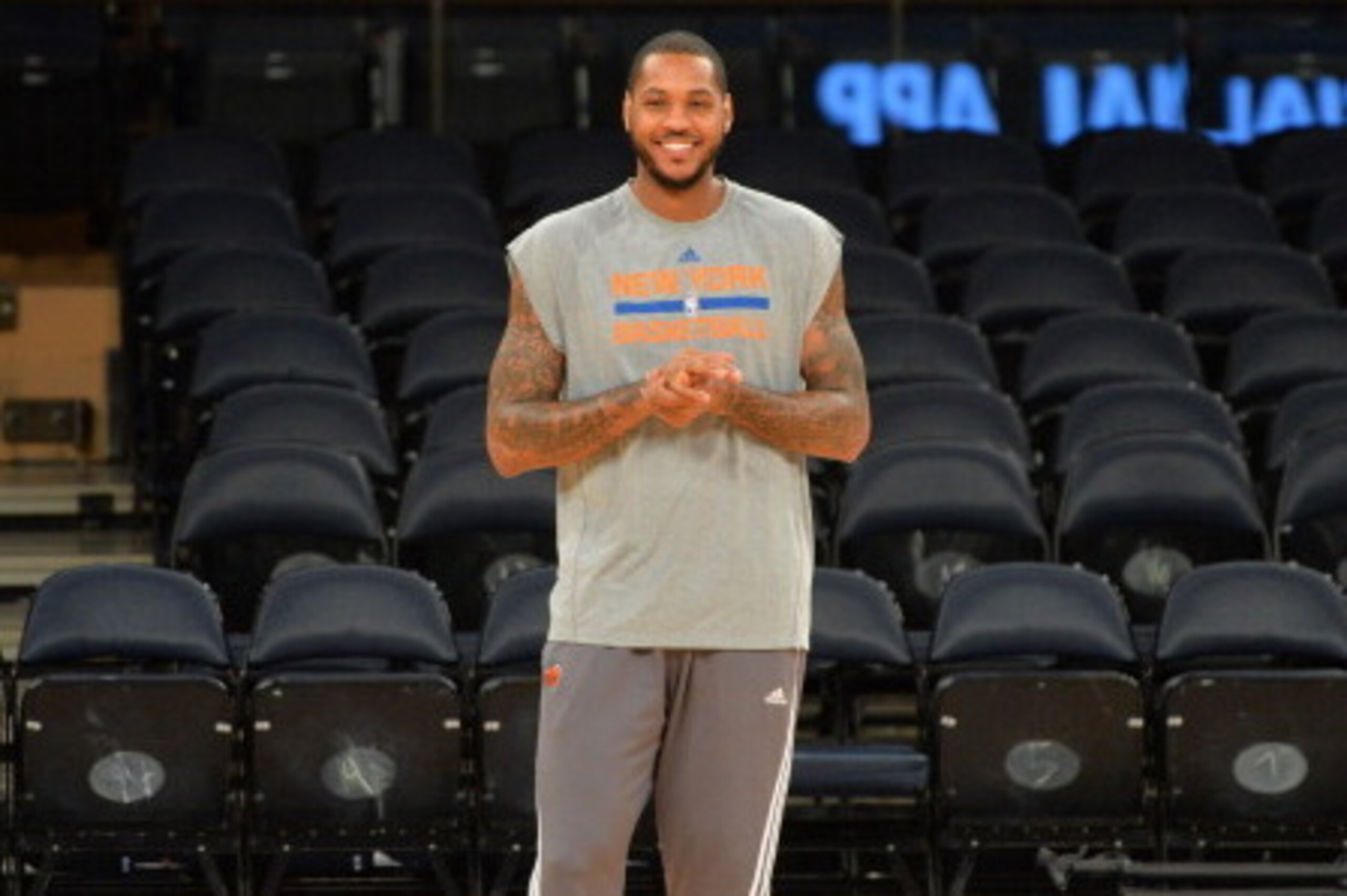 NEW YORK, NY - JANUARY 26: Carmelo Anthony #7 of the New York Knicks smiles on court before the game against the Los Angeles Lakers at Madison Square Garden on January 26, 2014 in New York, New York. NOTE TO USER: User expressly acknowledges and agrees th