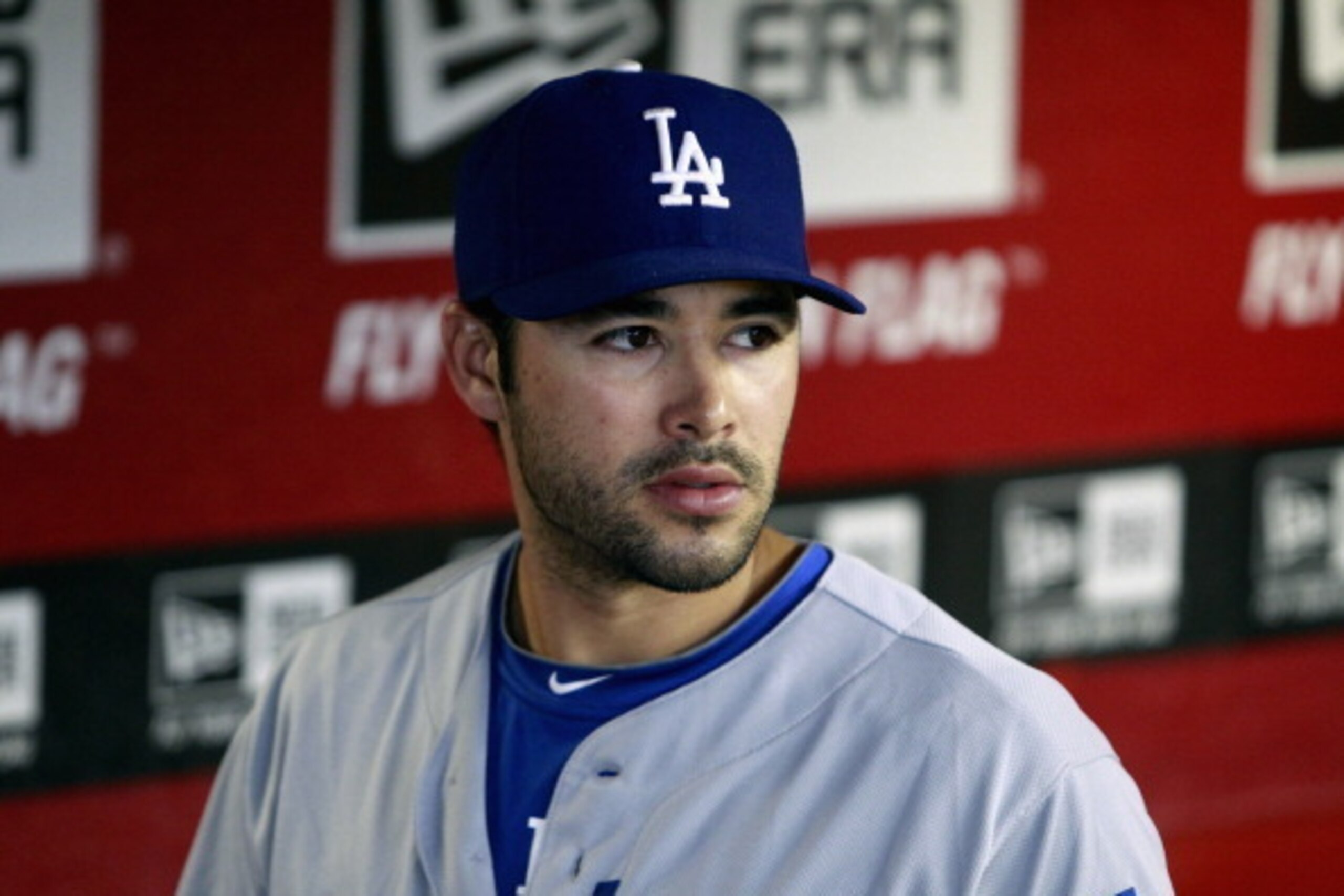 PHOENIX, AZ - MAY 18:  Andre Ethier #16 of the Los Angeles Dodgers looks on from the dugout during the start of a MLB game against the Arizona Diamondbacks at Chase Field on May 18, 2014 in Phoenix, Arizona.  (Photo by Ralph Freso/Getty Images)