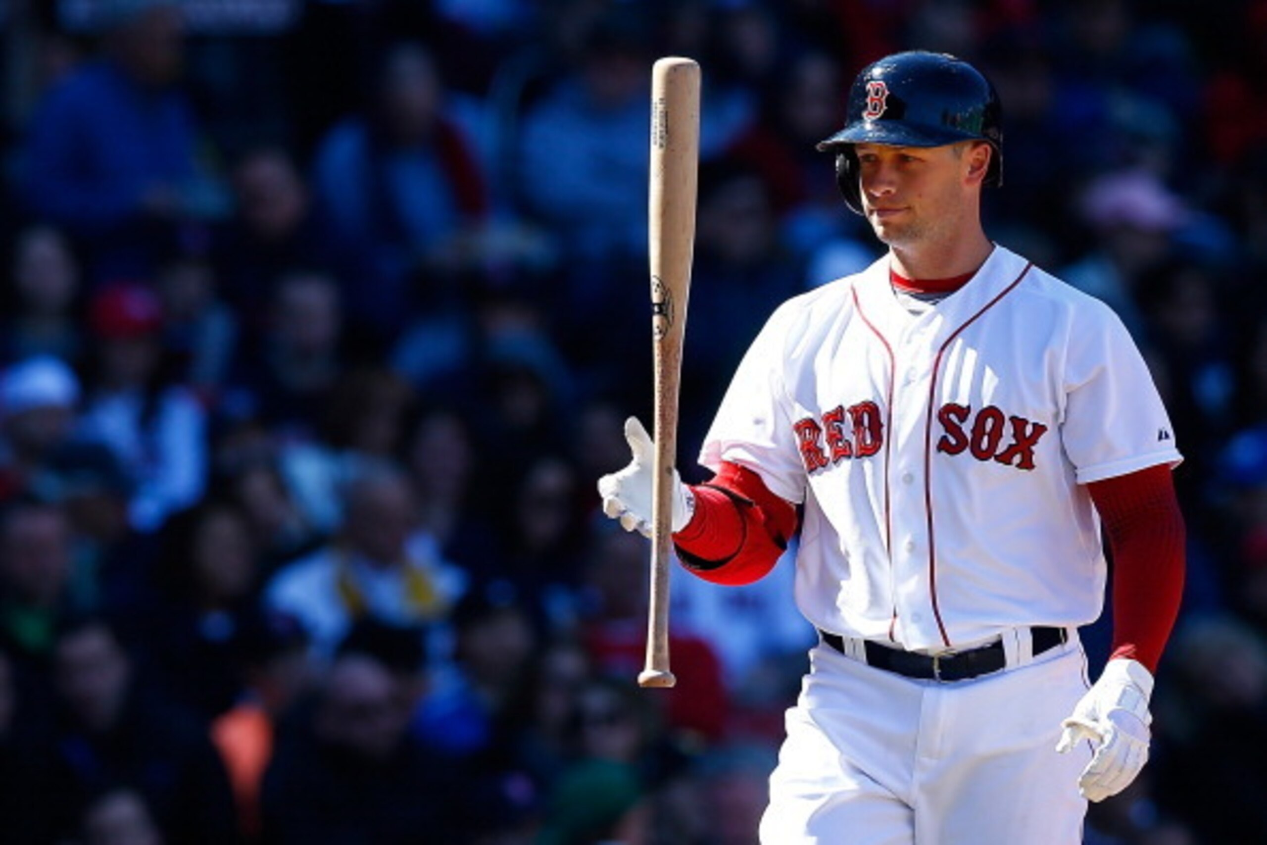 BOSTON, MA - APRIL 06: Daniel Nava #29 of the Boston Red Sox throws his bat in the air after striking out against the Milwaukee Brewers during the game at Fenway Park on April 6, 2014 in Boston, Massachusetts.  (Photo by Jared Wickerham/Getty Images)