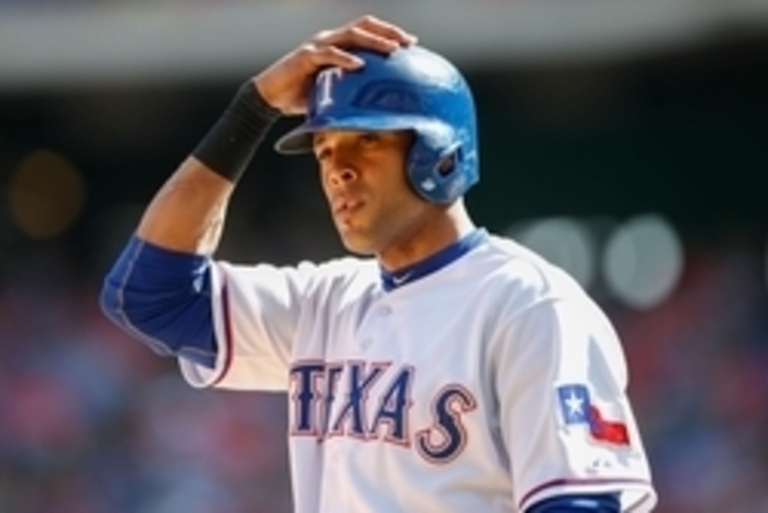 May 18, 2014; Arlington, TX, USA; Texas Rangers right fielder Alex Rios (51) reacts during the game against the Toronto Blue Jays at Globe Life Park in Arlington. Mandatory Credit: Kevin Jairaj-USA TODAY Sports
