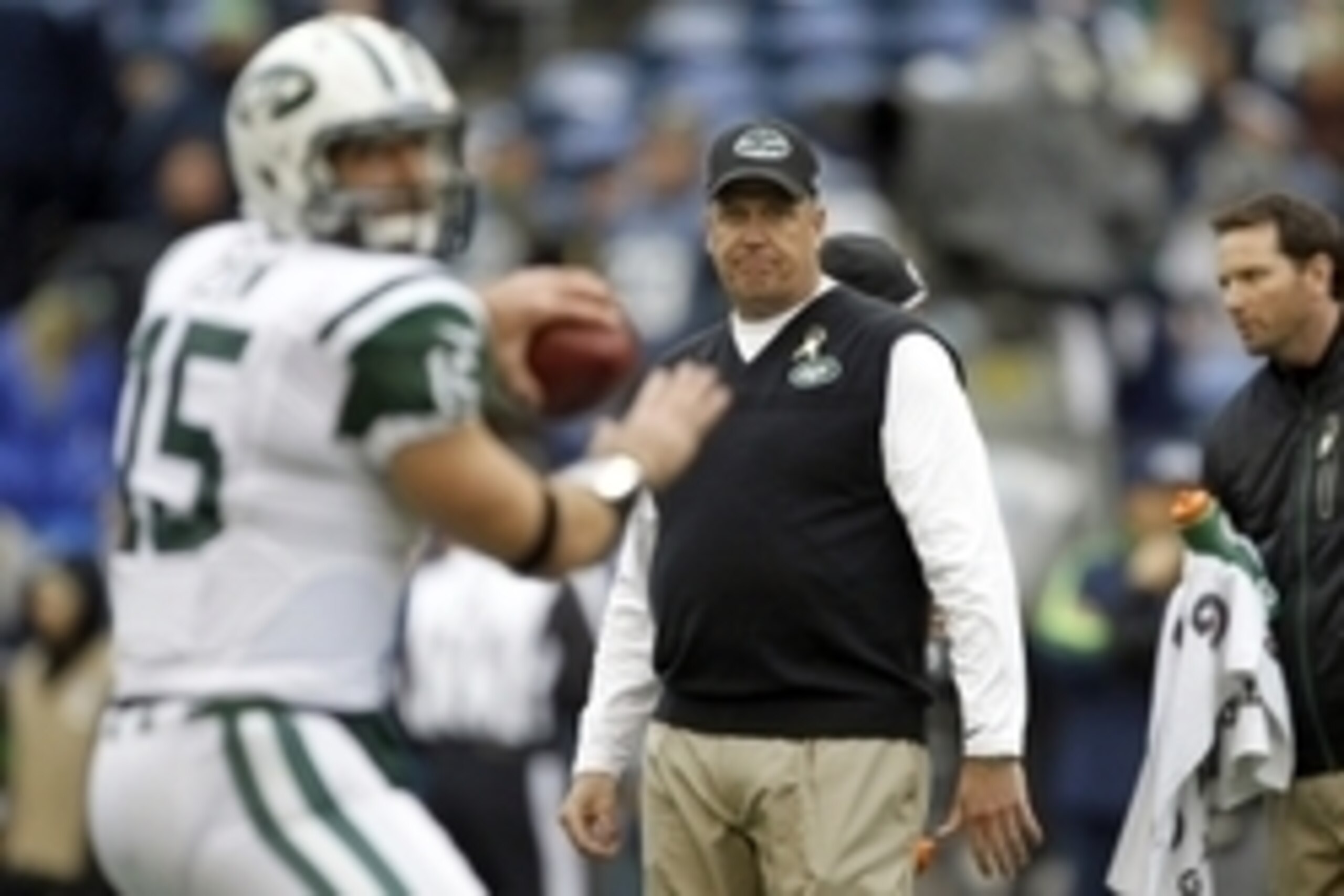 Nov 11, 2012; Seattle, WA, USA; New York Jets head coach Rex Ryan observes pre game warmups by New York Jets quarterback Tim Tebow (15) against the Seattle Seahawks at CenturyLink Field. Mandatory Credit: Joe Nicholson-USA TODAY Sports