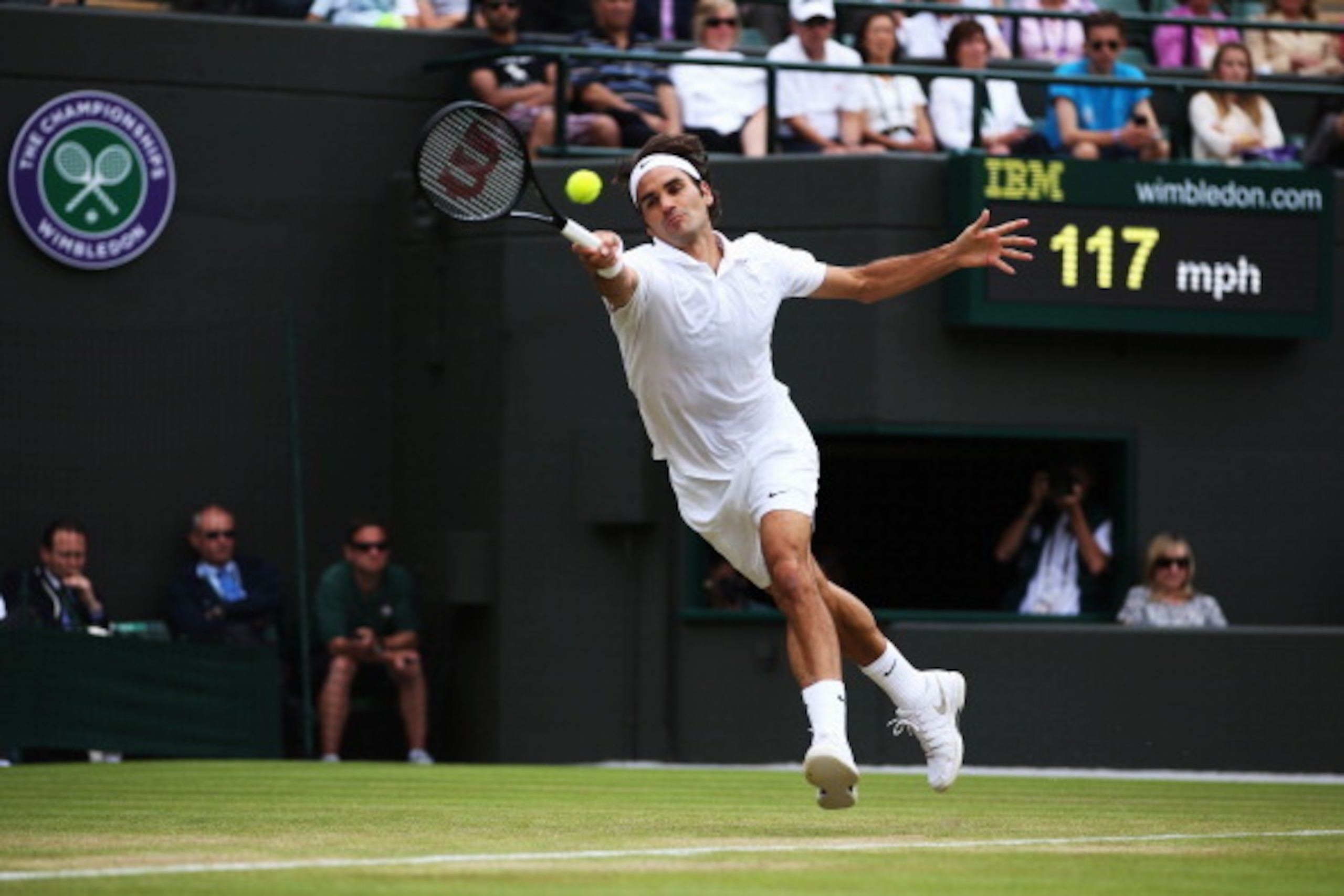 LONDON, ENGLAND - JULY 01:  Roger Federer of Switzerland during his Gentlemen's Singles fourth round match against Tommy Robredo of Spain on day eight of the Wimbledon Lawn Tennis Championships at the All England Lawn Tennis and Croquet Club on July 1, 20