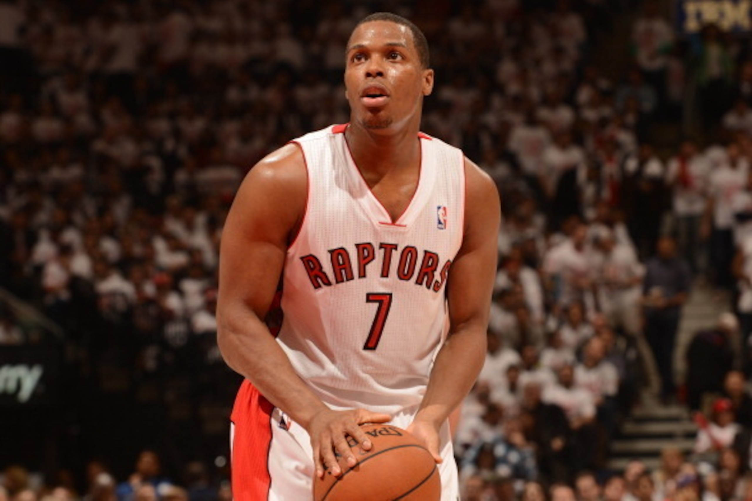 TORONTO, CANADA - April 19: Kyle Lowry #7 of the Toronto Raptors attempts a free throw against the Brooklyn Nets  during Game One of the Eastern Conference Quarterfinals of the 2014 NBA playoffs on April 19, 2014 at the Air Canada Centre in Toronto, Ontar