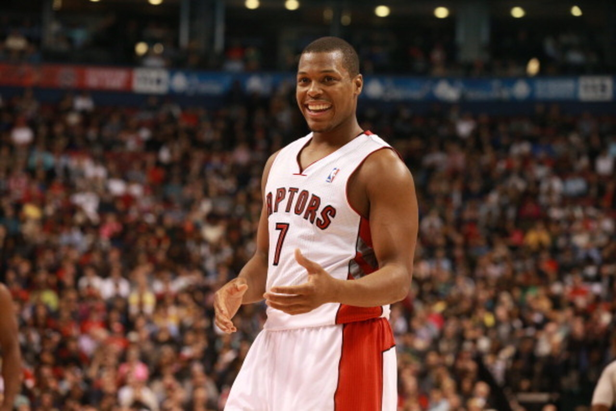 TORONTO,ON - APRIL 11:  Kyle Lowry #7 of the Toronto Raptors celebartes against the New York Knicks at the Air Canada Centre on April 11, 2014 in Toronto, Ontario, Canada. NOTE TO USER: User expressly acknowledges and agrees that, by downloading and/or us