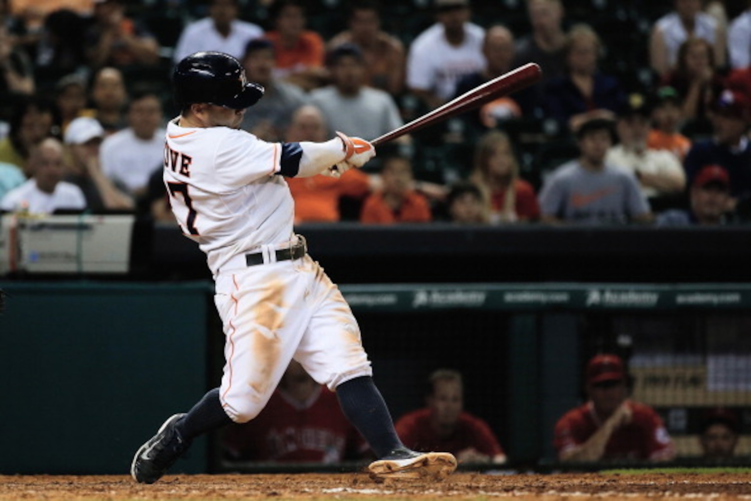 HOUSTON, TX - JUNE 05:  Jose Altuve #27 of the Houston Astros hits a two-run double in the eighth inning of their game against the Los Angeles Angels of Anaheim at Minute Maid Park on June 5, 2014 in Houston, Texas.  (Photo by Scott Halleran/Getty Images)