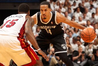 MIAMI, FL - May 8: Shaun Livingston #14 of the Brooklyn Nets handles the ball against the Miami Heat in Game Two of the Eastern Conference Semifinals of the 2014 NBA playoffs at the American Airlines Arena in Miami, Florida on May 8, 2014. NOTE TO USER: U