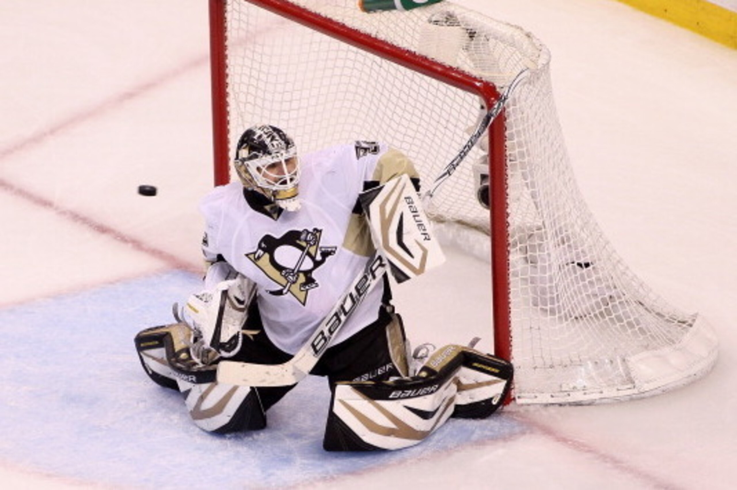 BOSTON, MA - JUNE 07: Tomas Vokoun #92 of the Pittsburgh Penguins tries to make a save as the puck goes off the crossbar in the third period against the Boston Bruins in Game Four of the Eastern Conference Final during the 2013 Stanley Cup Playoffs at TD 