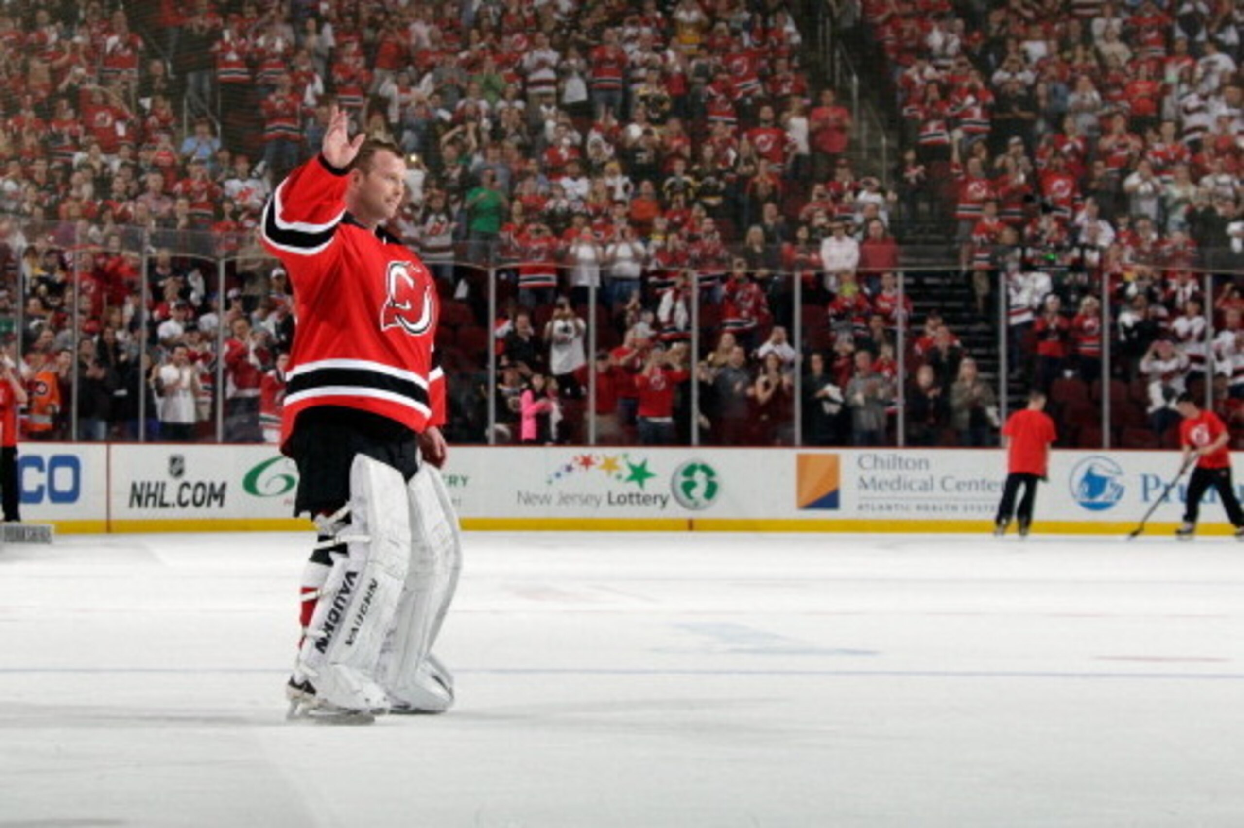 NEWARK, NJ - APRIL 13:  Martin Brodeur #30 of the New Jersey Devils salutes the fan while leaving the ice following a 3-2 victory over the Boston Bruins at the Prudential Center on April 13, 2014 in Newark, New Jersey. There has been speculation that this