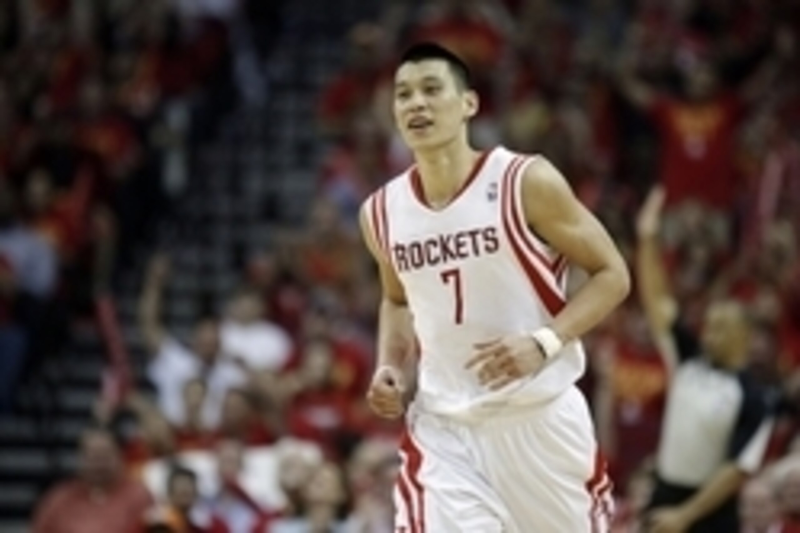Apr 30, 2014; Houston, TX, USA; Houston Rockets guard Jeremy Lin (7) celebrates after making a three-pointer during the fourth quarter against the Portland Trail Blazers in game five of the first round of the 2014 NBA Playoffs at Toyota Center. Mandatory 