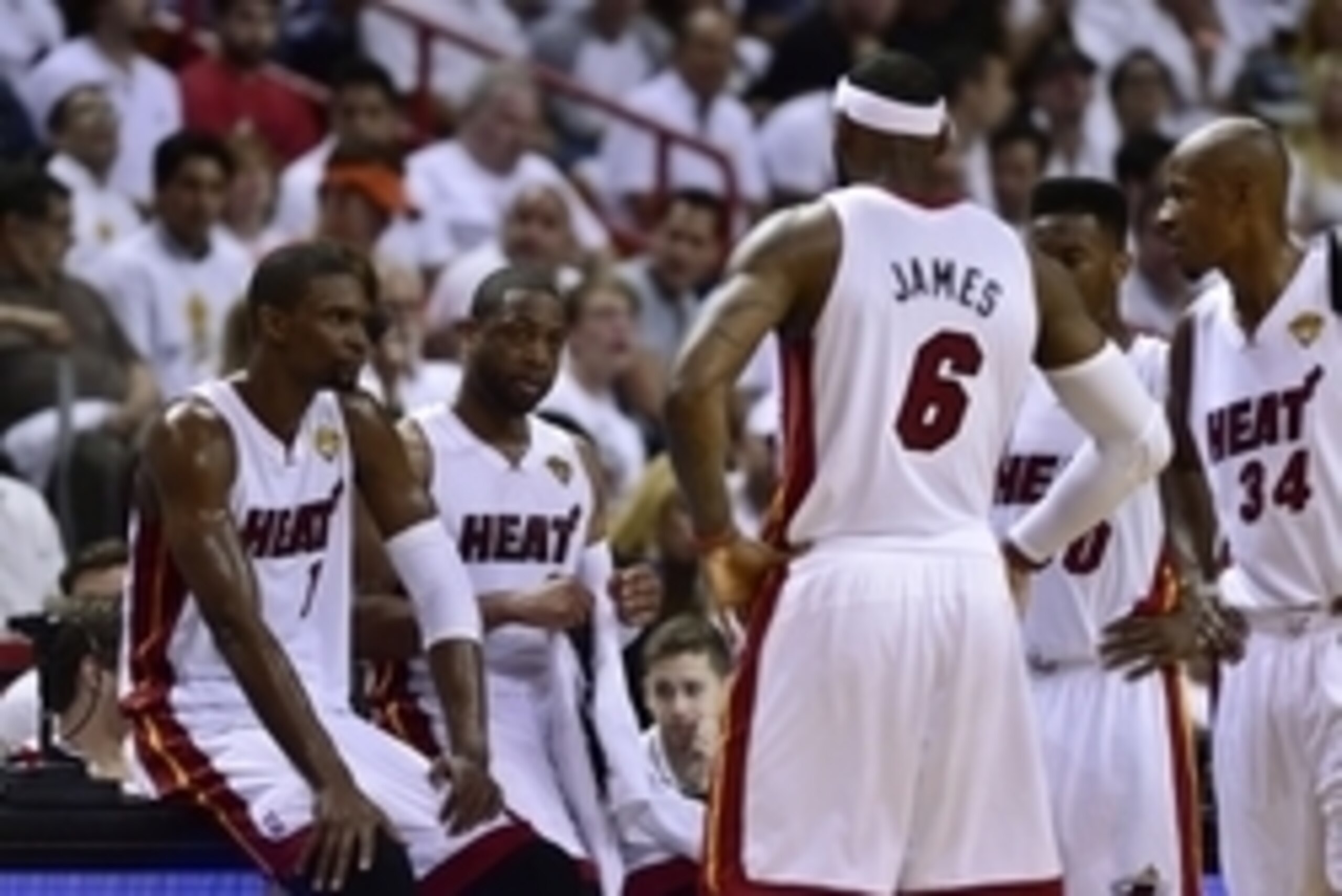 Jun 12, 2014; Miami, FL, USA; Miami Heat forward LeBron James (6) talks with center Chris Bosh (1), guard Dwyane Wade (3), guard Norris Cole (30) and guard Ray Allen (34)  during the second quarter of game four of the 2014 NBA Finals against the San Anton