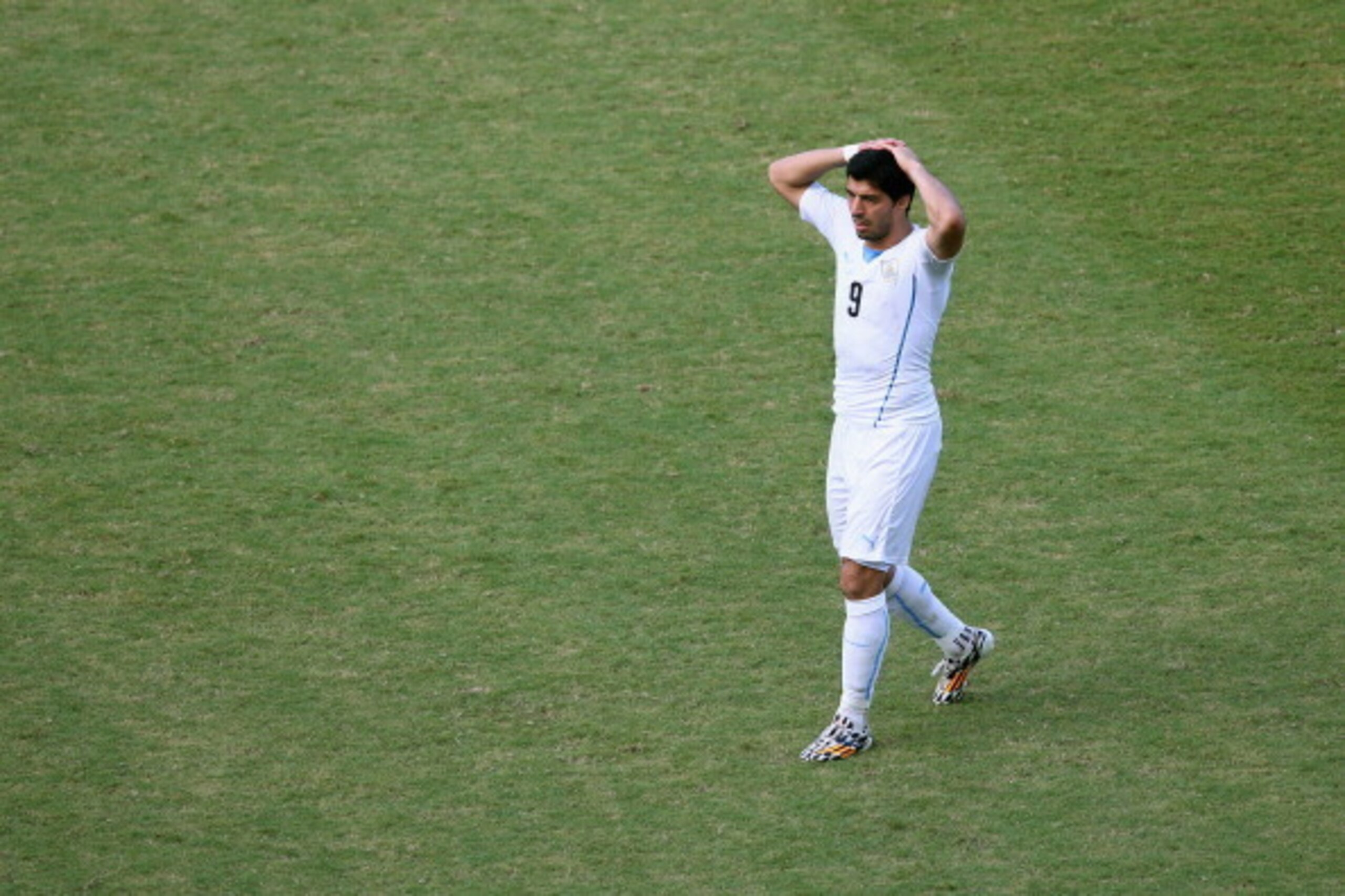 NATAL, BRAZIL - JUNE 24:  Luis Suarez of Uruguay reacts during the 2014 FIFA World Cup Brazil Group D match between Italy and Uruguay at Estadio das Dunas on June 24, 2014 in Natal, Brazil.  (Photo by Julian Finney/Getty Images)